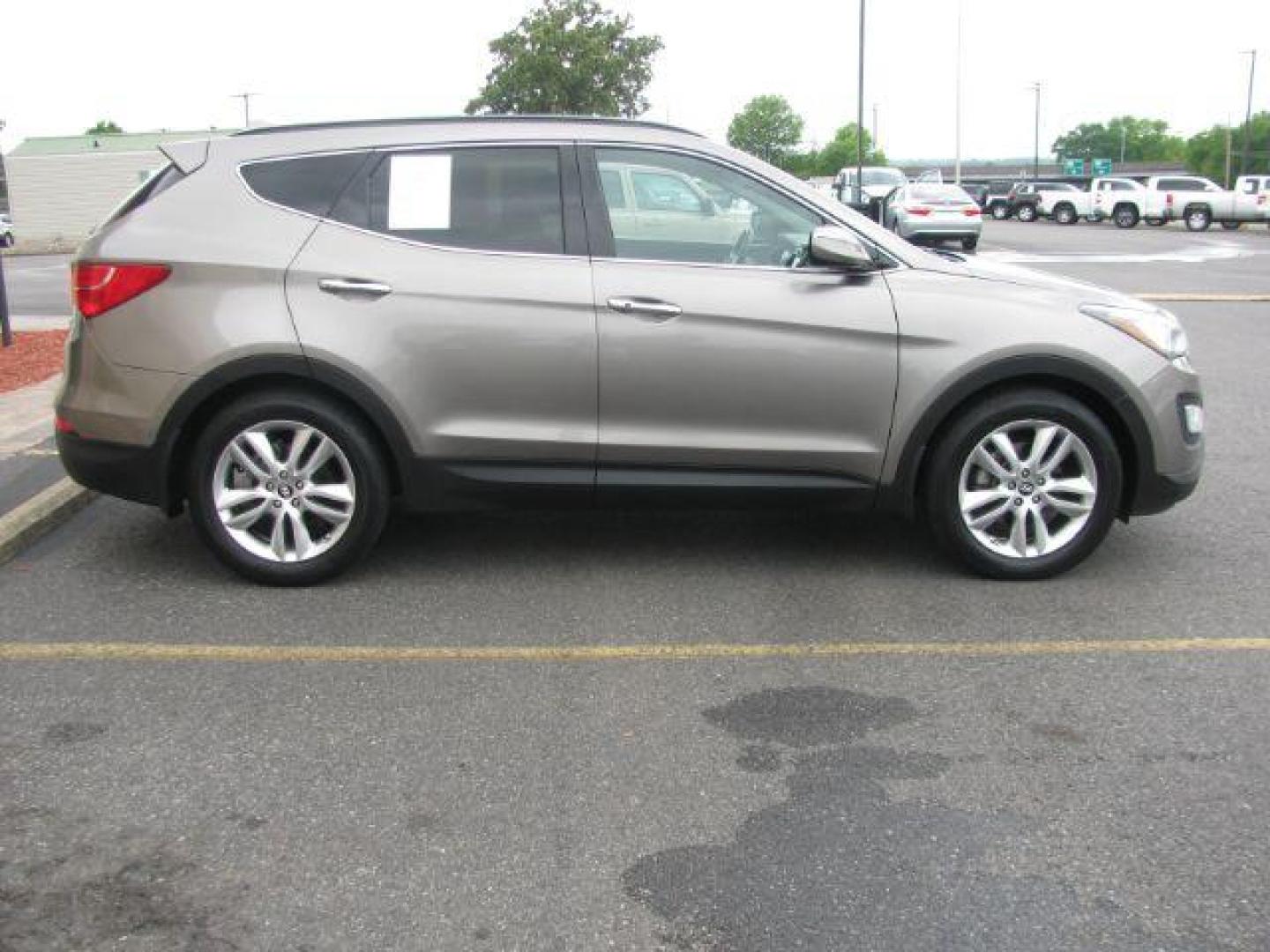 2015 Gray Hyundai Santa Fe Sport 2.0T FWD (5XYZW4LA8FG) with an 2.0L L4 DOHC 16V TURBO engine, 6-Speed Automatic transmission, located at 2443 Albert Pike, Hot Springs, AR, 71913, (501) 623-6255, 34.492222, -93.109993 - ALL LISTED FEATURES MAY NOT BE AVAILABLE!!!! - Photo#4