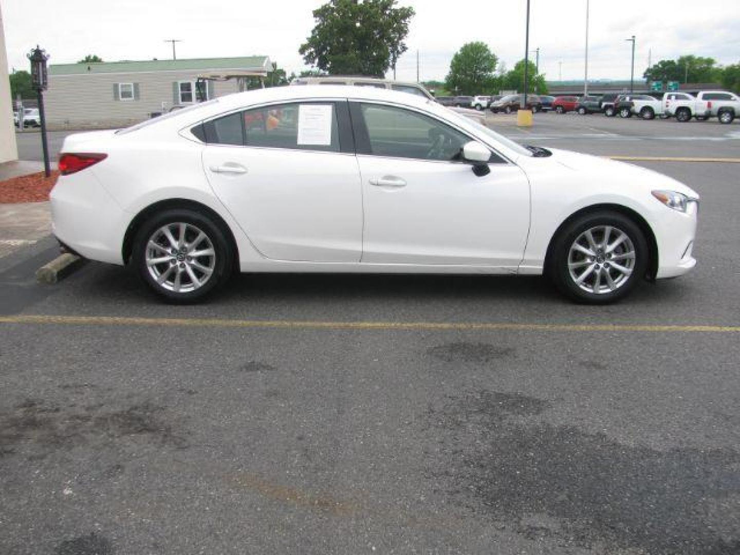 2015 White Mazda Mazda6 i Sport AT (JM1GJ1U59F1) with an 2.5L L4 DOHC 16V engine, 6-Speed Automatic transmission, located at 2443 Albert Pike, Hot Springs, AR, 71913, (501) 623-6255, 34.492222, -93.109993 - ALL LISTED FEATURES MAY NOT BE AVAILABLE!!!! - Photo#4