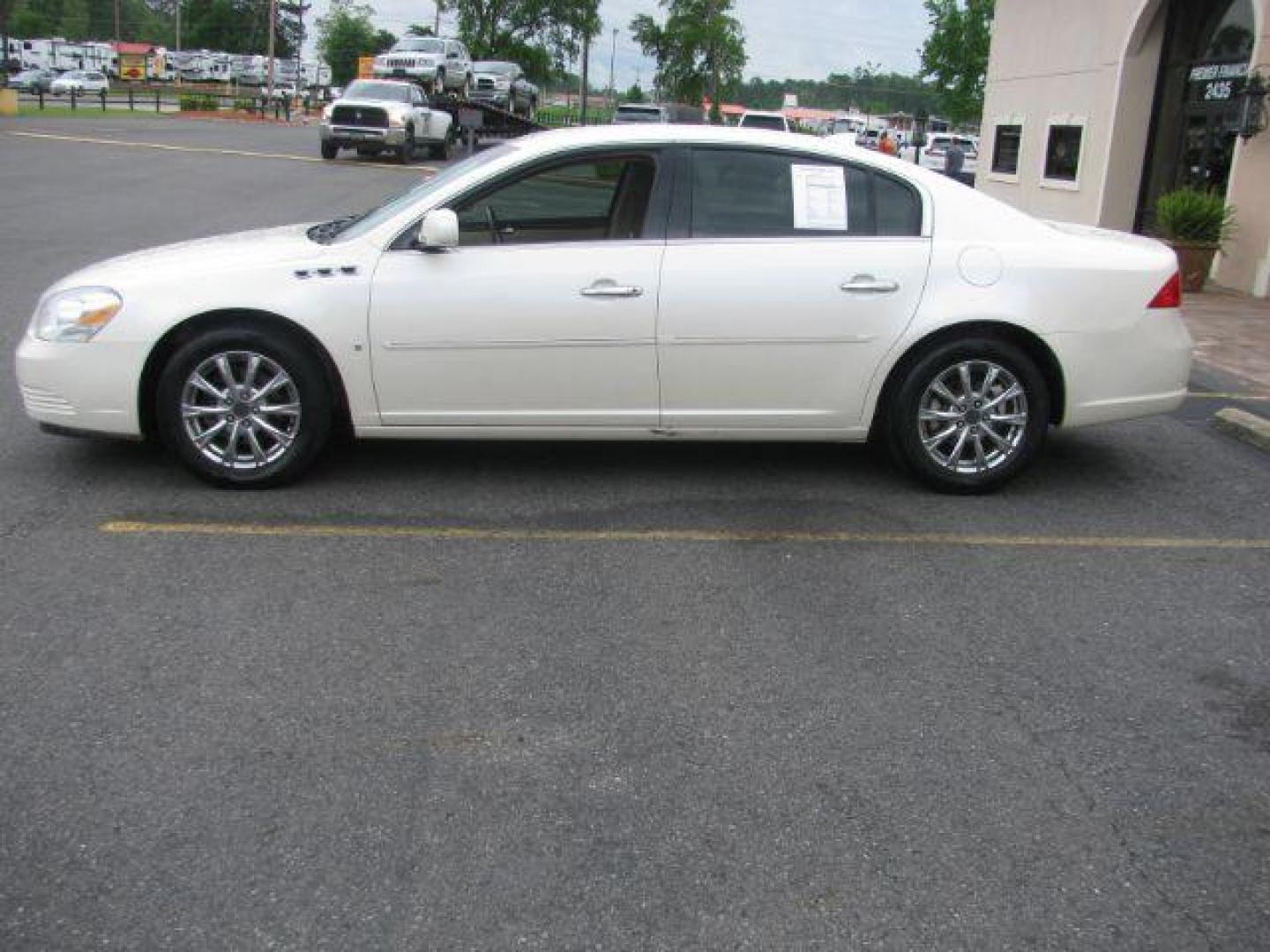 2009 White Buick Lucerne SEDAN 4-DR (1G4HD57M49U) with an 3.9L V6 OHV 12V engine, 4-Speed Automatic transmission, located at 2443 Albert Pike, Hot Springs, AR, 71913, (501) 623-6255, 34.492222, -93.109993 - Photo#1