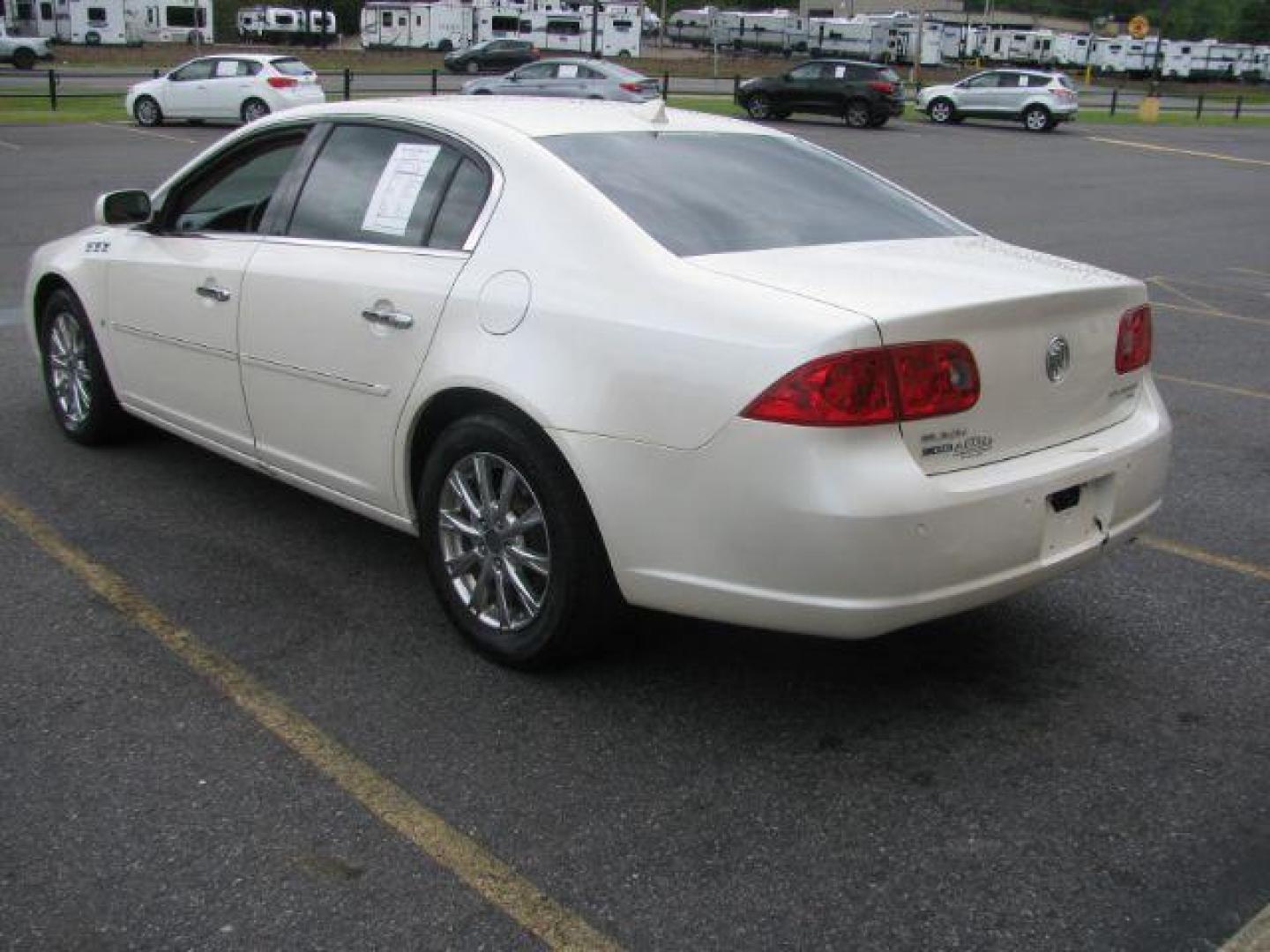 2009 White Buick Lucerne SEDAN 4-DR (1G4HD57M49U) with an 3.9L V6 OHV 12V engine, 4-Speed Automatic transmission, located at 2443 Albert Pike, Hot Springs, AR, 71913, (501) 623-6255, 34.492222, -93.109993 - Photo#2