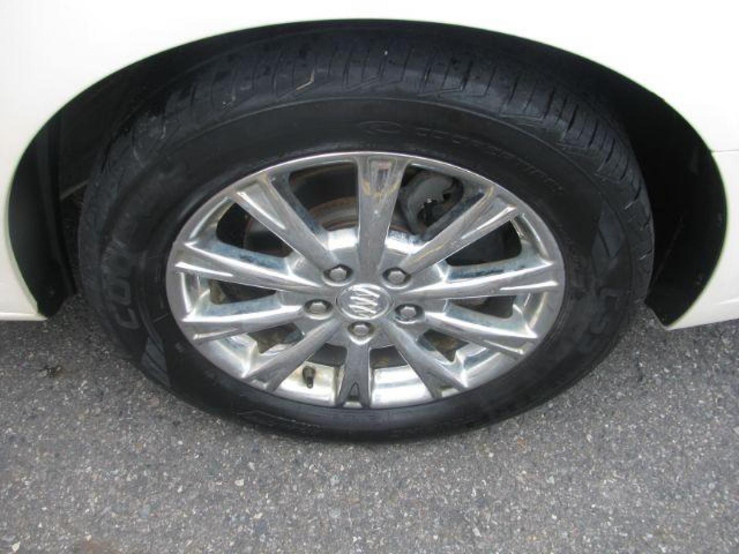 2009 White Buick Lucerne SEDAN 4-DR (1G4HD57M49U) with an 3.9L V6 OHV 12V engine, 4-Speed Automatic transmission, located at 2443 Albert Pike, Hot Springs, AR, 71913, (501) 623-6255, 34.492222, -93.109993 - Photo#6