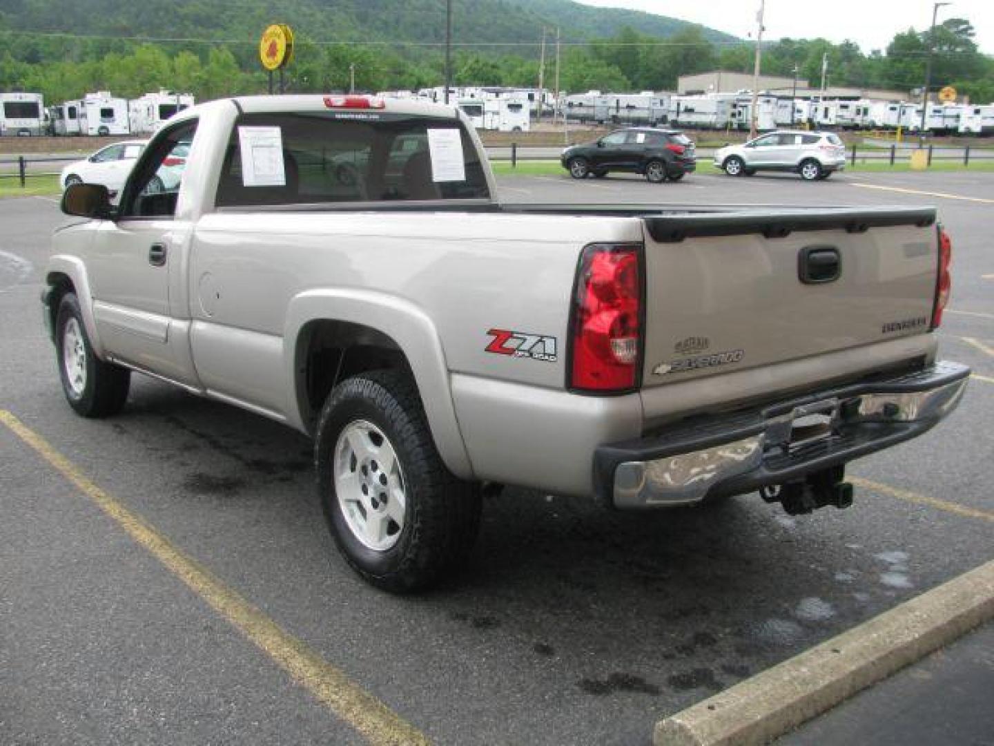 2005 Pewter Chevrolet Silverado 1500 LS Long Bed 4WD (1GCEK14T55Z) with an 5.3L V8 OHV 16V engine, located at 2443 Albert Pike, Hot Springs, AR, 71913, (501) 623-6255, 34.492222, -93.109993 - ALL LISTED FEATURES MAY NOT BE AVAILABLE!!!! - Photo#2