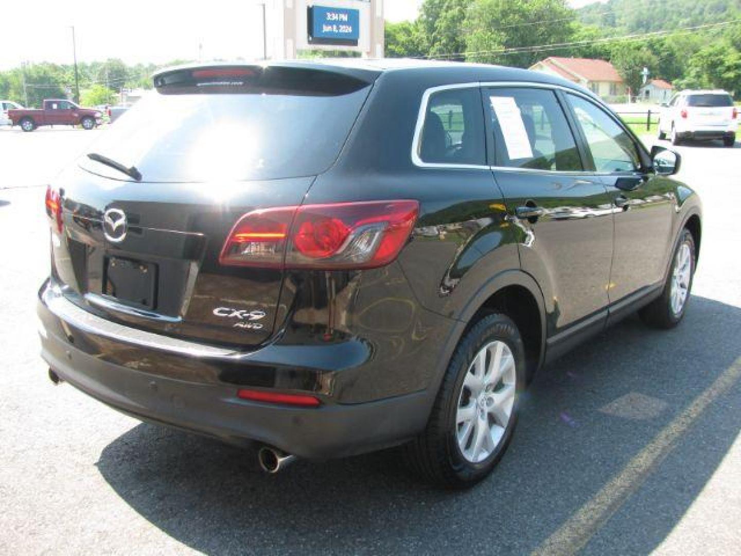 2013 Black Mazda CX-9 Touring AWD (JM3TB3CV7D0) with an 3.7L V6 DOHC 24V engine, 6-Speed Automatic transmission, located at 2443 Albert Pike, Hot Springs, AR, 71913, (501) 623-6255, 34.492222, -93.109993 - Photo#3