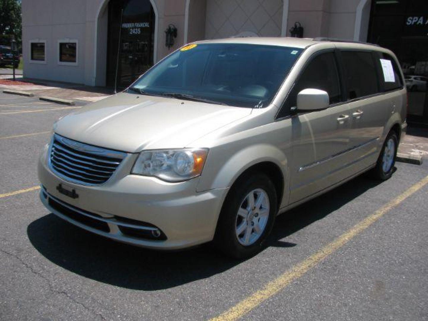 2011 Gold Chrysler Town and Country Touring (2A4RR5DG0BR) with an 3.6L V6 DOHC 24V engine, 6-Speed Automatic transmission, located at 2443 Albert Pike, Hot Springs, AR, 71913, (501) 623-6255, 34.492222, -93.109993 - Photo#0