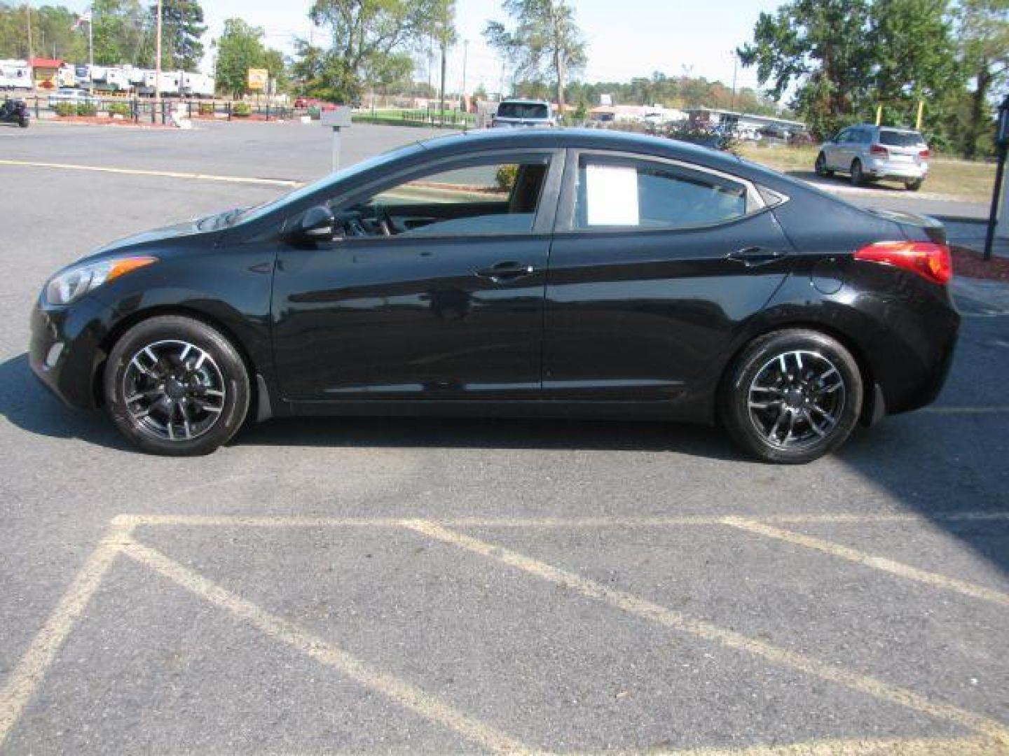 2012 Black Hyundai Elantra Limited (5NPDH4AE2CH) with an 1.8L L4 DOHC 16V engine, 6-Speed Automatic transmission, located at 2443 Albert Pike, Hot Springs, AR, 71913, (501) 623-6255, 34.492222, -93.109993 - Photo#1