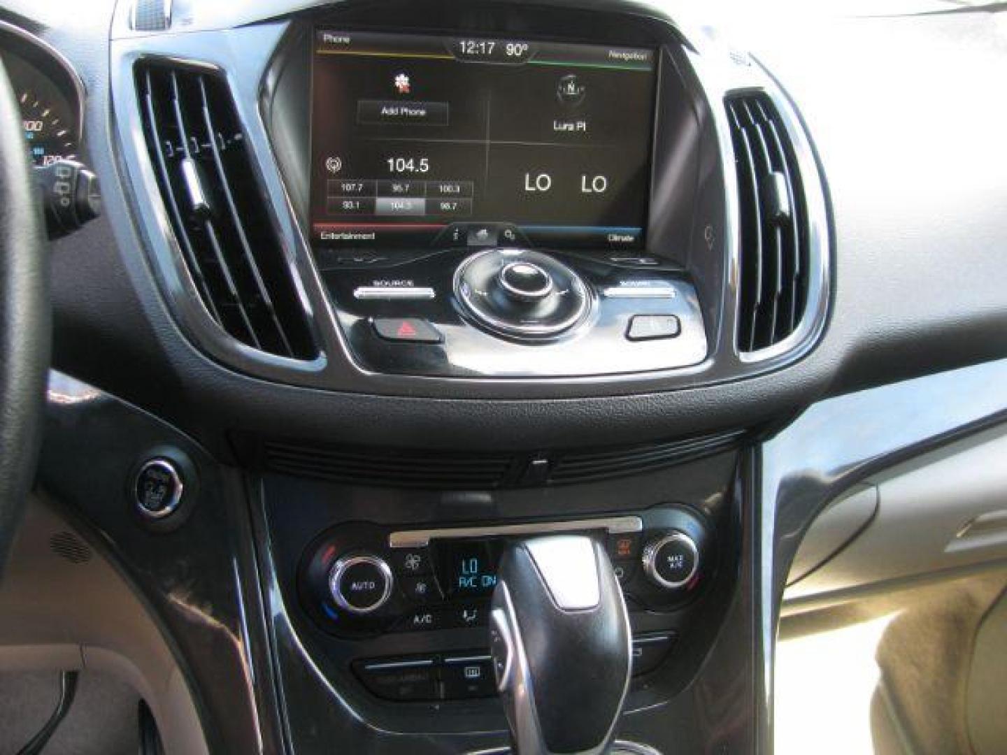 2014 Black Ford Escape Titanium FWD (1FMCU0JX0EU) with an 1.6L L4 DOHC 16V engine, 6-Speed Automatic transmission, located at 2443 Albert Pike, Hot Springs, AR, 71913, (501) 623-6255, 34.492222, -93.109993 - Photo#9
