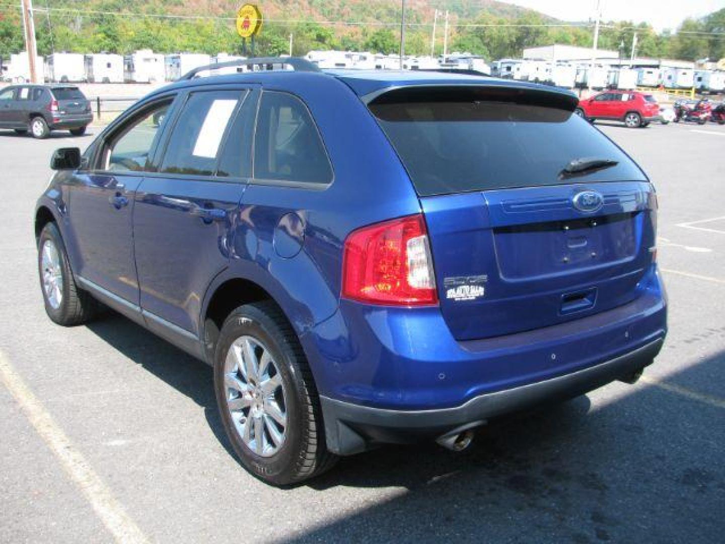 2013 Blue Ford Edge SEL FWD (2FMDK3JC1DB) with an 3.5L V6 DOHC 24V engine, 6-Speed Automatic transmission, located at 2443 Albert Pike, Hot Springs, AR, 71913, (501) 623-6255, 34.492222, -93.109993 - Photo#3