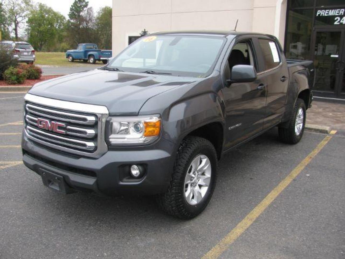 2016 Gray GMC Canyon SLE Crew Cab 4WD (1GTG6CE35G1) with an 3.6L V6 DOHC 24V engine, 6-Speed Automatic transmission, located at 2443 Albert Pike, Hot Springs, AR, 71913, (501) 623-6255, 34.492222, -93.109993 - Photo#0