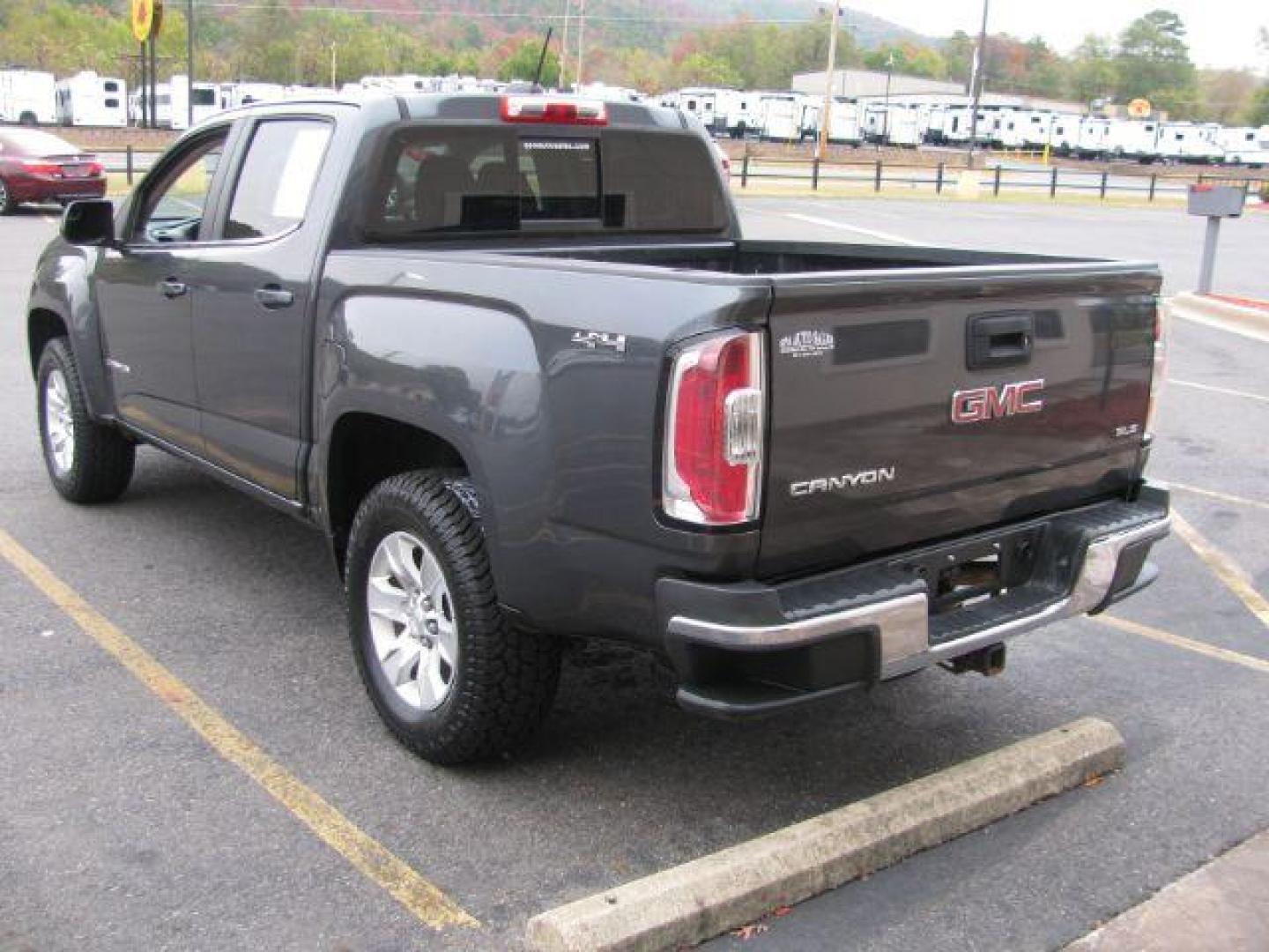 2016 Gray GMC Canyon SLE Crew Cab 4WD (1GTG6CE35G1) with an 3.6L V6 DOHC 24V engine, 6-Speed Automatic transmission, located at 2443 Albert Pike, Hot Springs, AR, 71913, (501) 623-6255, 34.492222, -93.109993 - Photo#2
