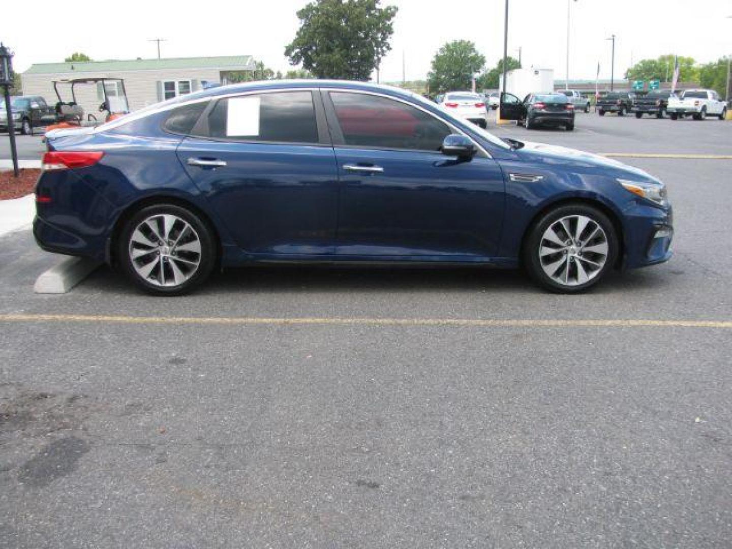 2019 Blue Kia Optima LX (5XXGT4L3XKG) with an 2.4L L4 DOHC 16V engine, 6-Speed Automatic transmission, located at 2443 Albert Pike, Hot Springs, AR, 71913, (501) 623-6255, 34.492222, -93.109993 - Photo#4