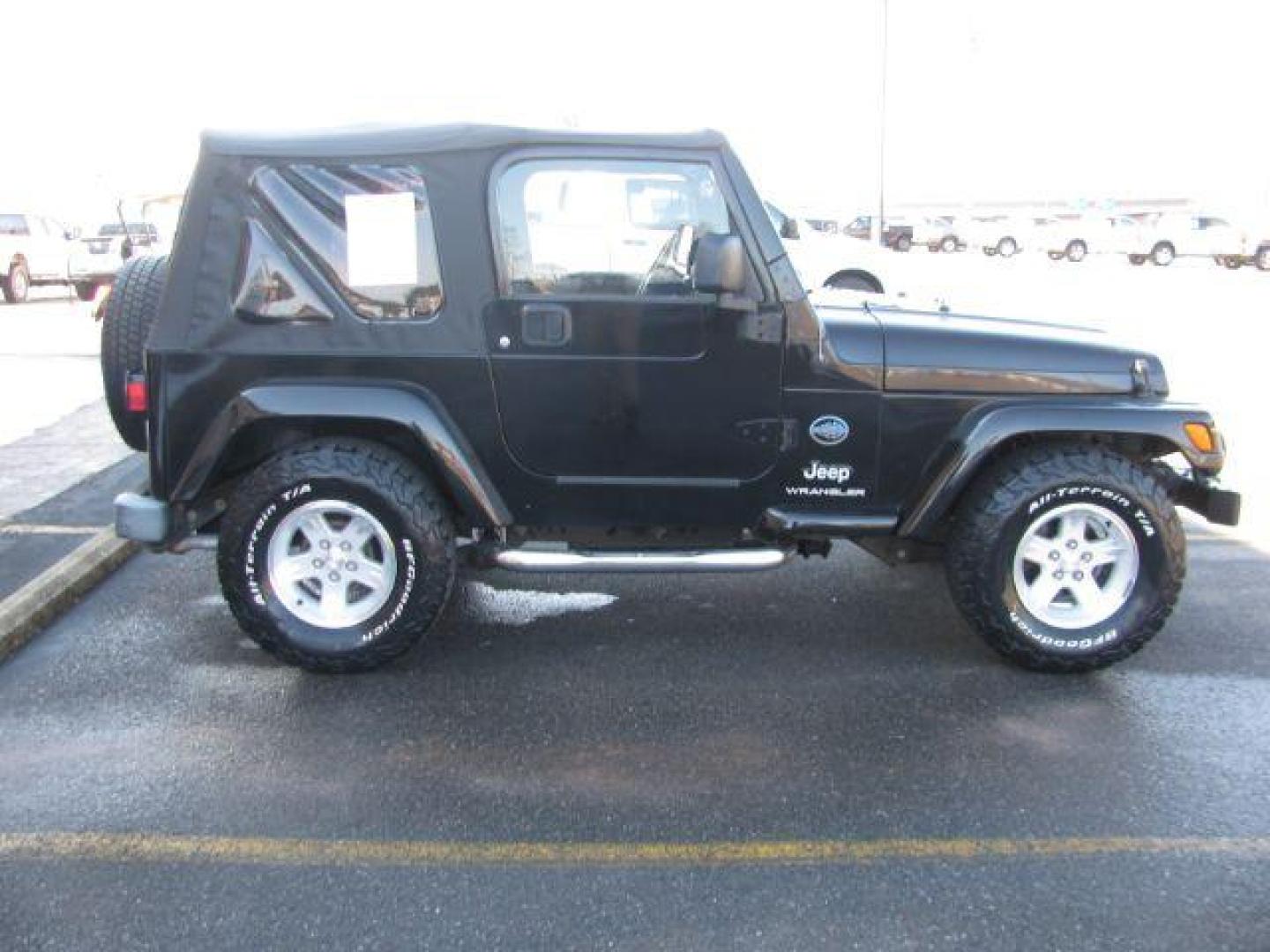 2005 Black Jeep Wrangler X (1J4FA39S95P) with an 4.0L L6 OHV 12V engine, located at 2443 Albert Pike, Hot Springs, AR, 71913, (501) 623-6255, 34.492222, -93.109993 - Photo#4
