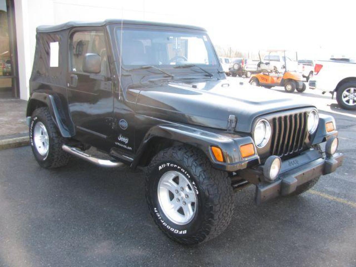 2005 Black Jeep Wrangler X (1J4FA39S95P) with an 4.0L L6 OHV 12V engine, located at 2443 Albert Pike, Hot Springs, AR, 71913, (501) 623-6255, 34.492222, -93.109993 - Photo#5