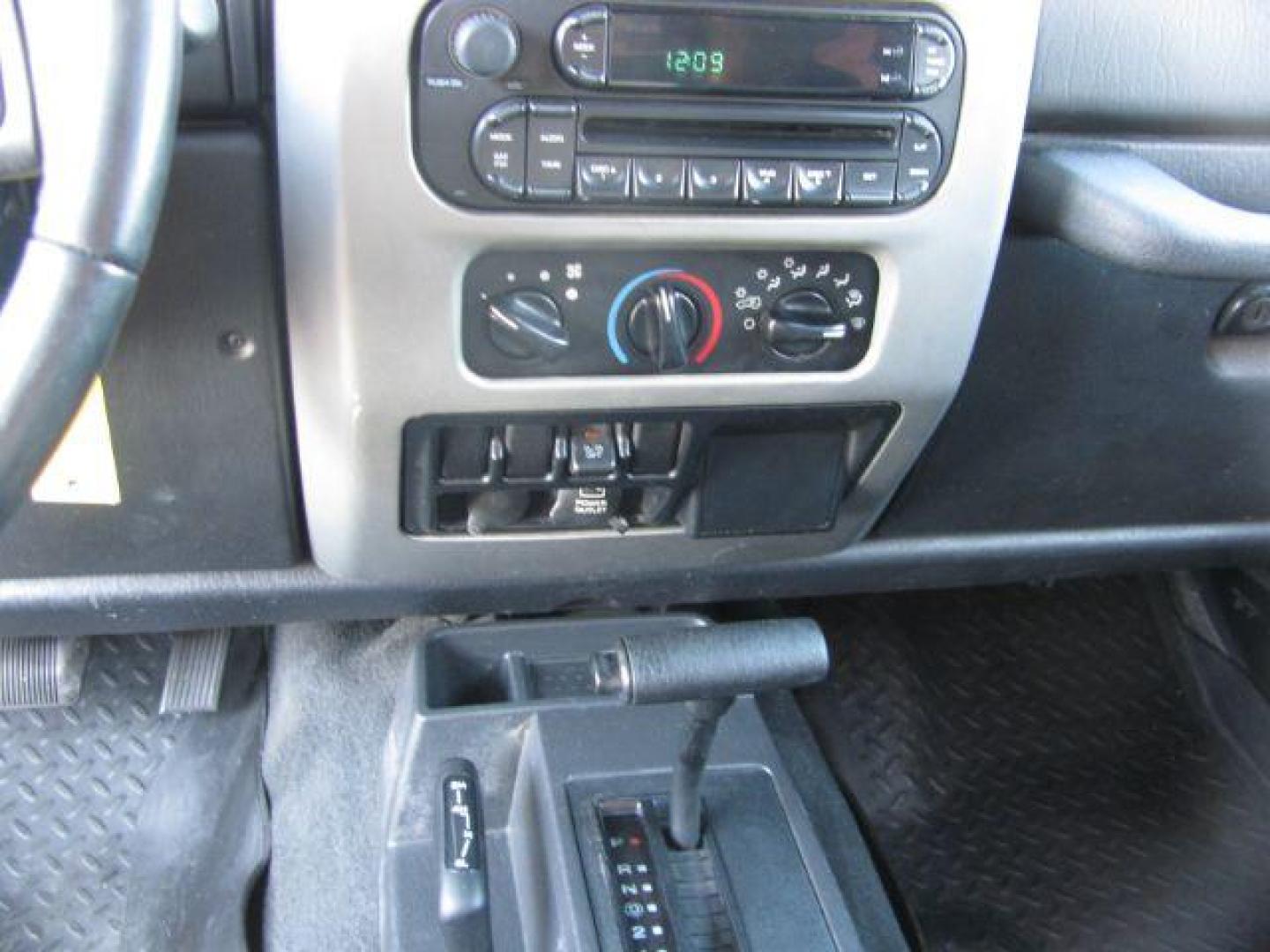 2005 Black Jeep Wrangler X (1J4FA39S95P) with an 4.0L L6 OHV 12V engine, located at 2443 Albert Pike, Hot Springs, AR, 71913, (501) 623-6255, 34.492222, -93.109993 - Photo#8
