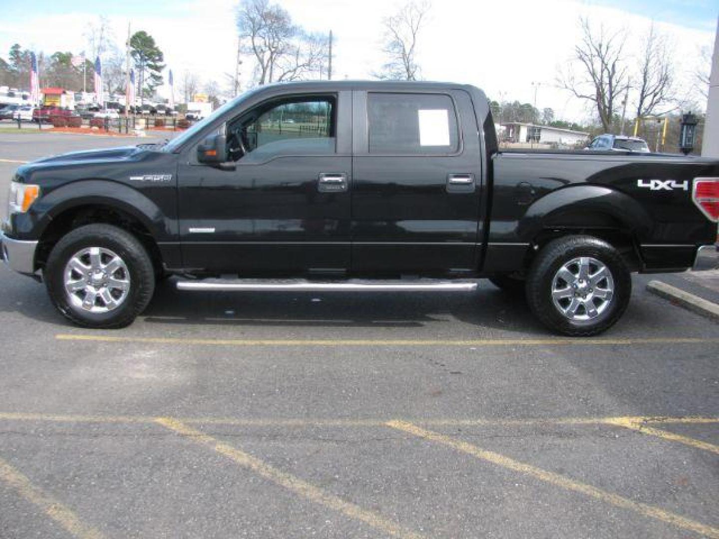 2013 Black Ford F-150 XLT SuperCrew 5.5-ft. Bed 4WD (1FTFW1ETXDK) with an 3.5L V6 TURBO engine, 6-Speed Automatic transmission, located at 2443 Albert Pike, Hot Springs, AR, 71913, (501) 623-6255, 34.492222, -93.109993 - Photo#1
