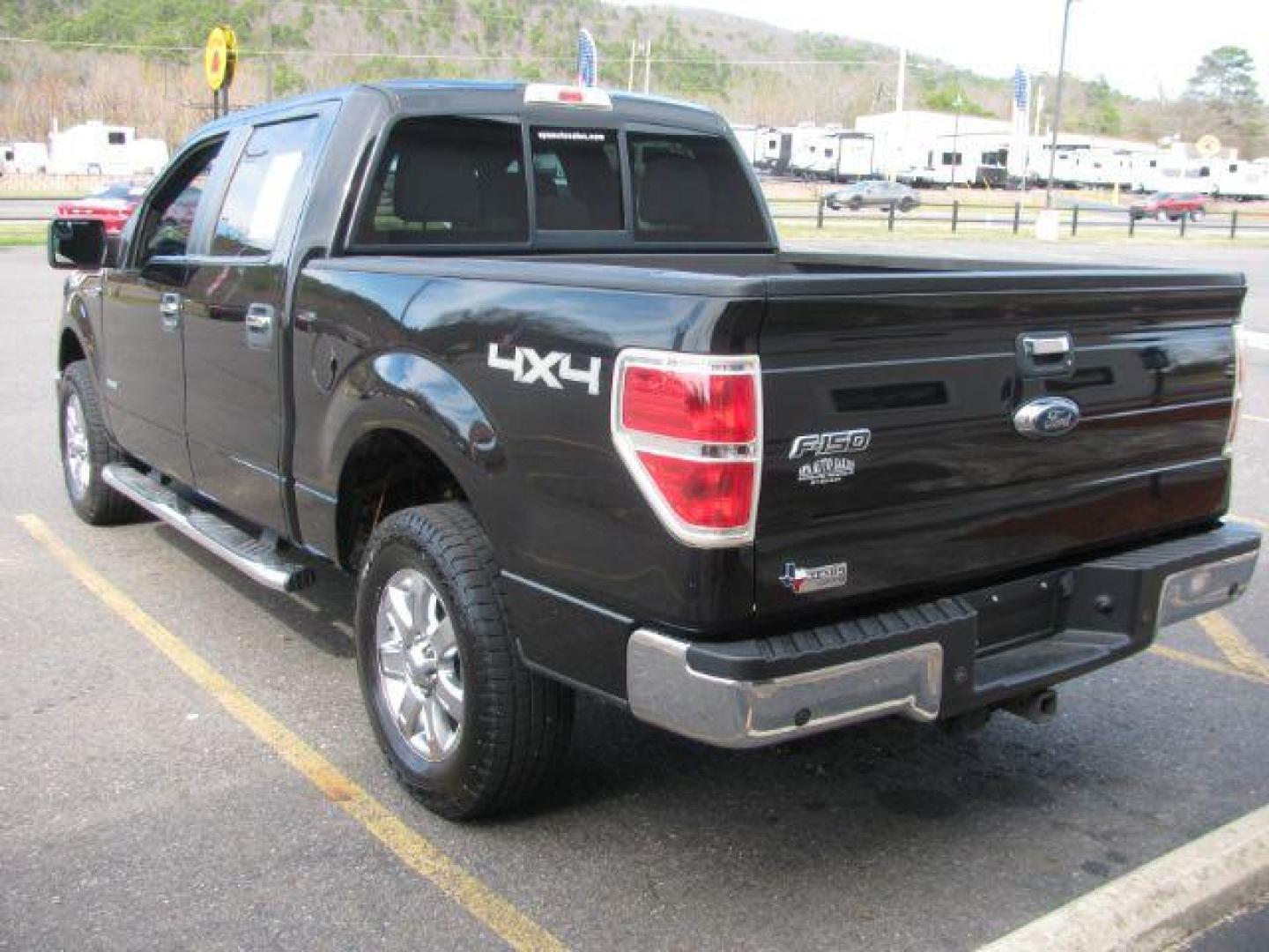 2013 Black Ford F-150 XLT SuperCrew 5.5-ft. Bed 4WD (1FTFW1ETXDK) with an 3.5L V6 TURBO engine, 6-Speed Automatic transmission, located at 2443 Albert Pike, Hot Springs, AR, 71913, (501) 623-6255, 34.492222, -93.109993 - Photo#2
