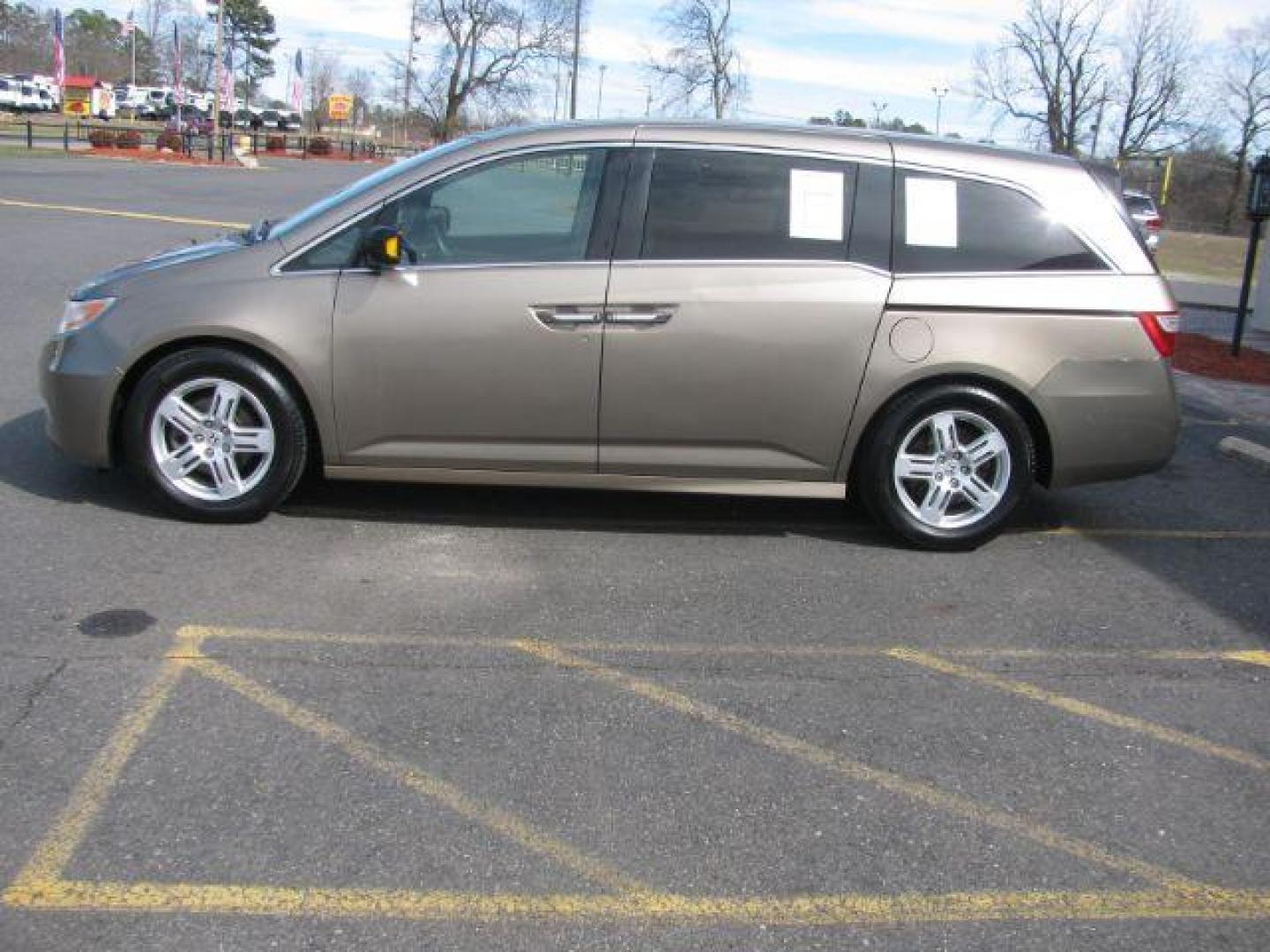 2013 Tan Honda Odyssey Touring | Touring Elite (5FNRL5H90DB) with an 3.5L V-6 i-VTEC variable valve control engine, located at 2443 Albert Pike, Hot Springs, AR, 71913, (501) 623-6255, 34.492222, -93.109993 - Photo#1