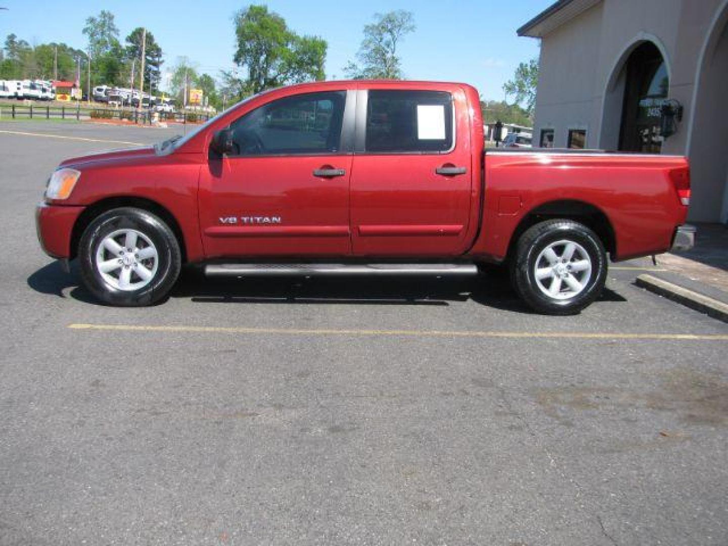 2014 Maroon Nissan Titan SV Crew Cab 2WD (1N6BA0EKXEN) with an 5.6L V8 DOHC 32V FFV engine, 5-Speed Automatic transmission, located at 2443 Albert Pike, Hot Springs, AR, 71913, (501) 623-6255, 34.492222, -93.109993 - Photo#1