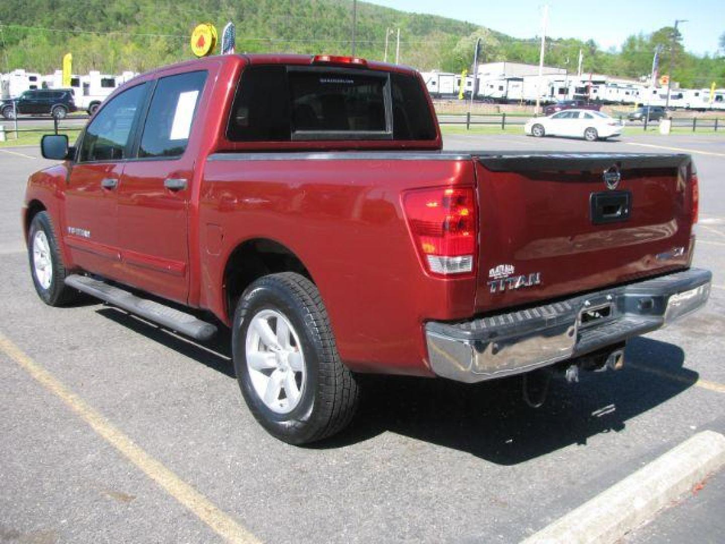 2014 Maroon Nissan Titan SV Crew Cab 2WD (1N6BA0EKXEN) with an 5.6L V8 DOHC 32V FFV engine, 5-Speed Automatic transmission, located at 2443 Albert Pike, Hot Springs, AR, 71913, (501) 623-6255, 34.492222, -93.109993 - Photo#2