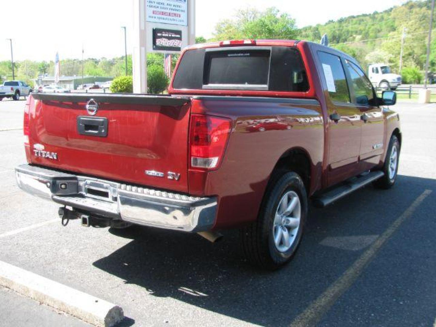 2014 Maroon Nissan Titan SV Crew Cab 2WD (1N6BA0EKXEN) with an 5.6L V8 DOHC 32V FFV engine, 5-Speed Automatic transmission, located at 2443 Albert Pike, Hot Springs, AR, 71913, (501) 623-6255, 34.492222, -93.109993 - Photo#4