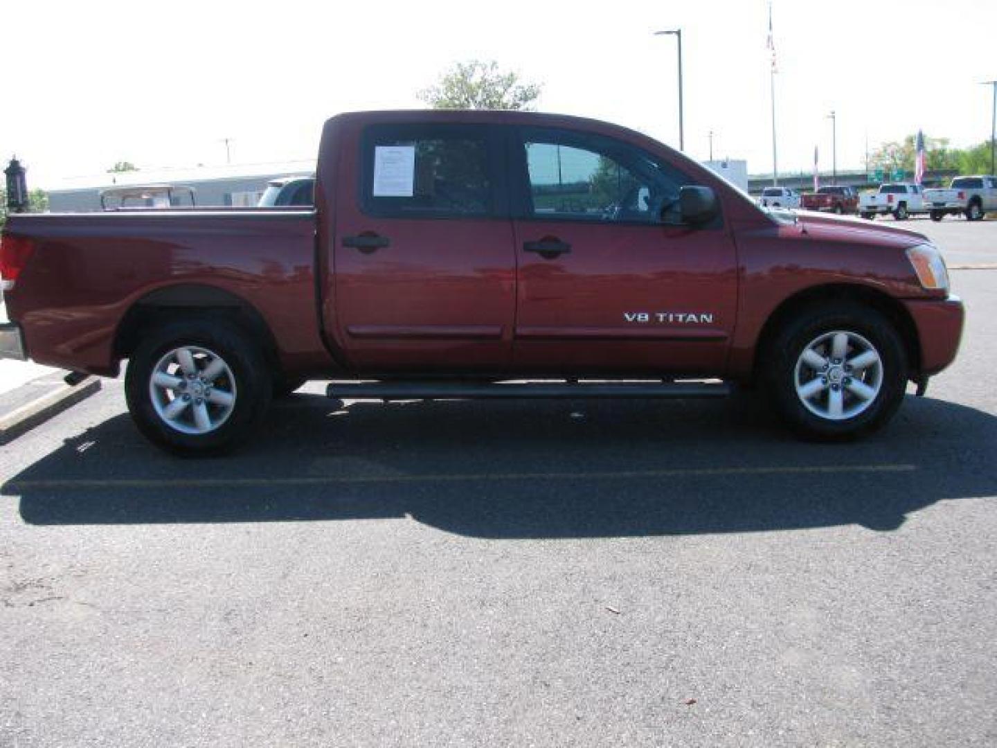 2014 Maroon Nissan Titan SV Crew Cab 2WD (1N6BA0EKXEN) with an 5.6L V8 DOHC 32V FFV engine, 5-Speed Automatic transmission, located at 2443 Albert Pike, Hot Springs, AR, 71913, (501) 623-6255, 34.492222, -93.109993 - Photo#5