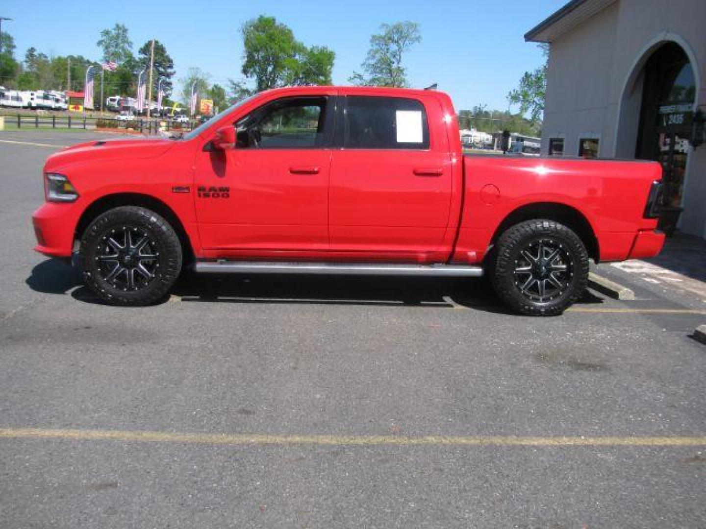 2016 Red Ram 1500 Sport (1C6RR7MT9GS) with an HEMI 5.7L V-8 variable valve control engine, located at 2443 Albert Pike, Hot Springs, AR, 71913, (501) 623-6255, 34.492222, -93.109993 - Photo#1