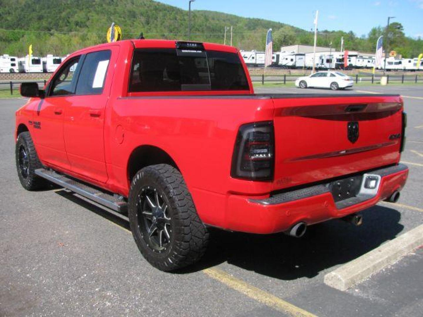 2016 Red Ram 1500 Sport (1C6RR7MT9GS) with an HEMI 5.7L V-8 variable valve control engine, located at 2443 Albert Pike, Hot Springs, AR, 71913, (501) 623-6255, 34.492222, -93.109993 - Photo#2