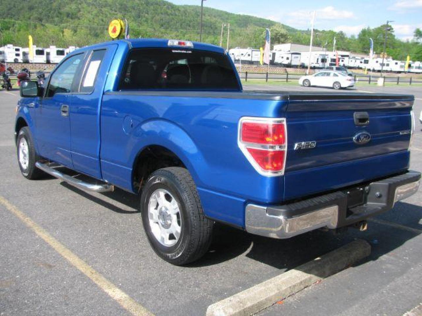 2013 Blue Ford F-150 XLT (1FTEX1CM9DF) with an 3.7L V-6 DOHC engine, Automatic transmission, located at 2443 Albert Pike, Hot Springs, AR, 71913, (501) 623-6255, 34.492222, -93.109993 - Photo#2