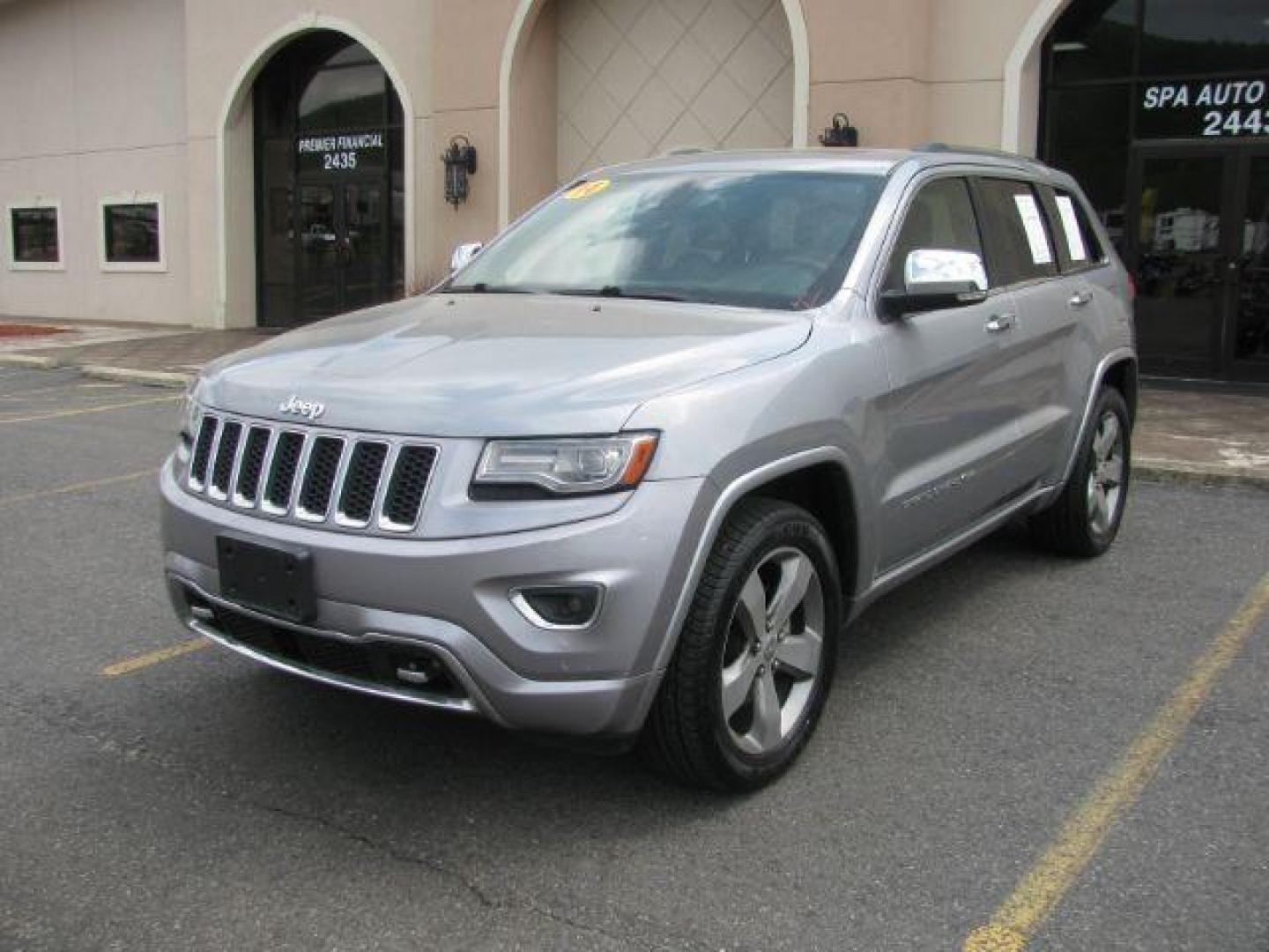 2014 Silver Jeep Grand Cherokee Overland (1C4RJECG4EC) with an 3.6L V-6 DOHC engine, Automatic transmission, located at 2443 Albert Pike, Hot Springs, AR, 71913, (501) 623-6255, 34.492222, -93.109993 - Photo#0