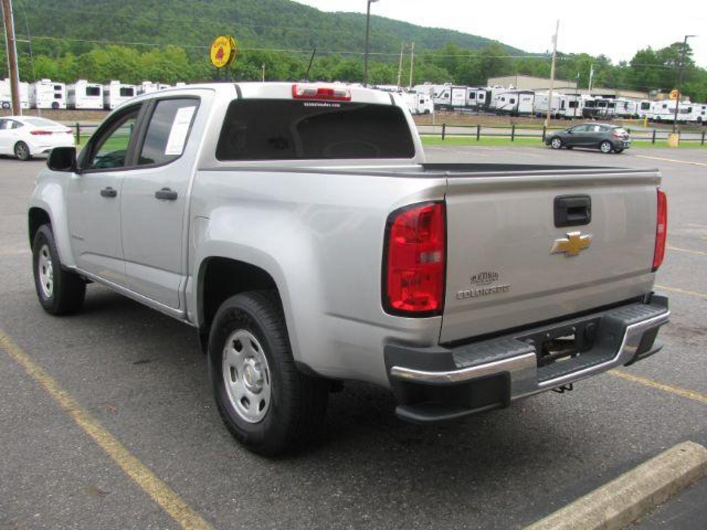 2019 Silver Chevrolet Colorado WT (1GCGSBEAXK1) with an 2.5L I-4 gasoline direct injection engine, Automatic transmission, located at 2443 Albert Pike, Hot Springs, AR, 71913, (501) 623-6255, 34.492222, -93.109993 - Photo#2