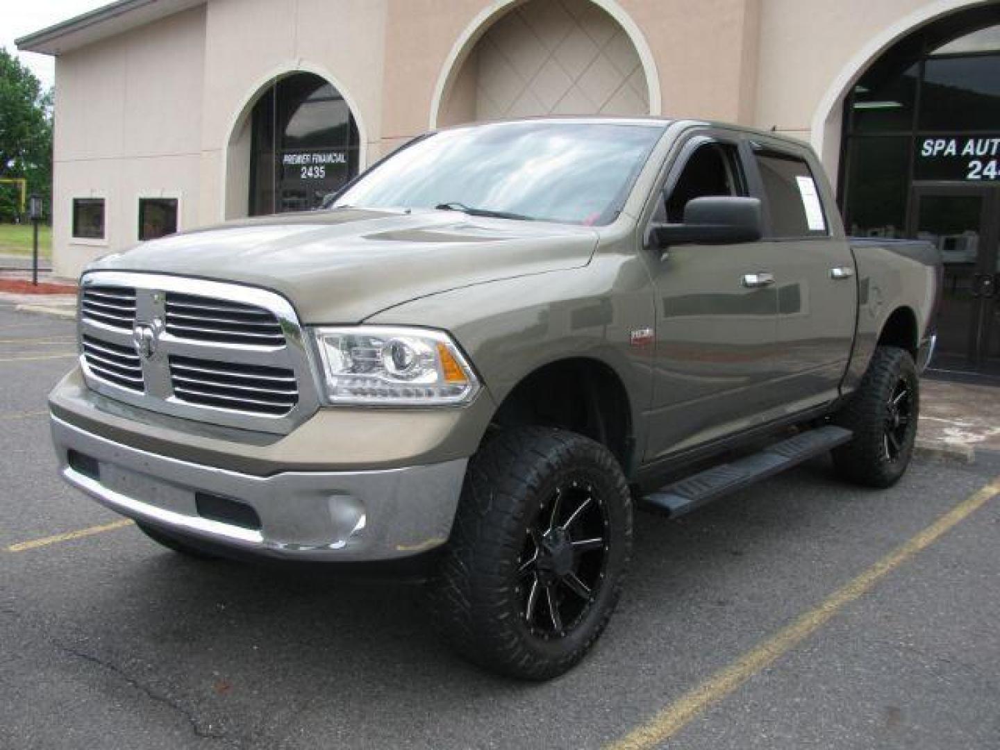 2013 Tan Ram 1500 Big Horn (1C6RR6LT0DS) with an HEMI 5.7L V-8 variable valve control engine, located at 2443 Albert Pike, Hot Springs, AR, 71913, (501) 623-6255, 34.492222, -93.109993 - Photo#0