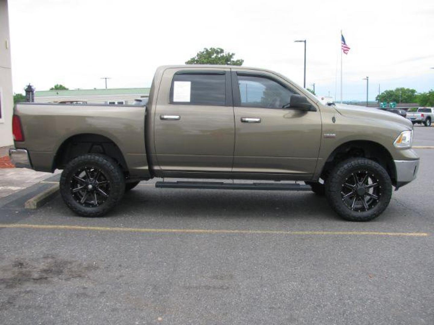 2013 Tan Ram 1500 Big Horn (1C6RR6LT0DS) with an HEMI 5.7L V-8 variable valve control engine, located at 2443 Albert Pike, Hot Springs, AR, 71913, (501) 623-6255, 34.492222, -93.109993 - Photo#5