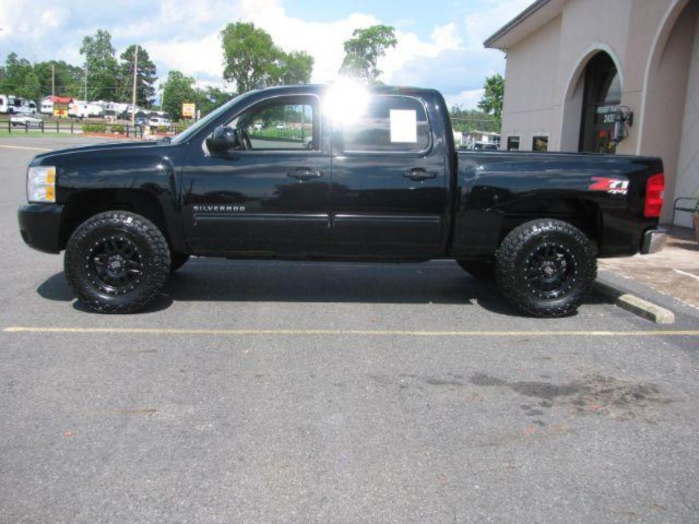 2010 Black Chevrolet Silverado 1500 LTZ (3GCRKTE32AG) with an Vortec 5.3L V-8 variable valve control engine, Automatic transmission, located at 2443 Albert Pike, Hot Springs, AR, 71913, (501) 623-6255, 34.492222, -93.109993 - Photo#1