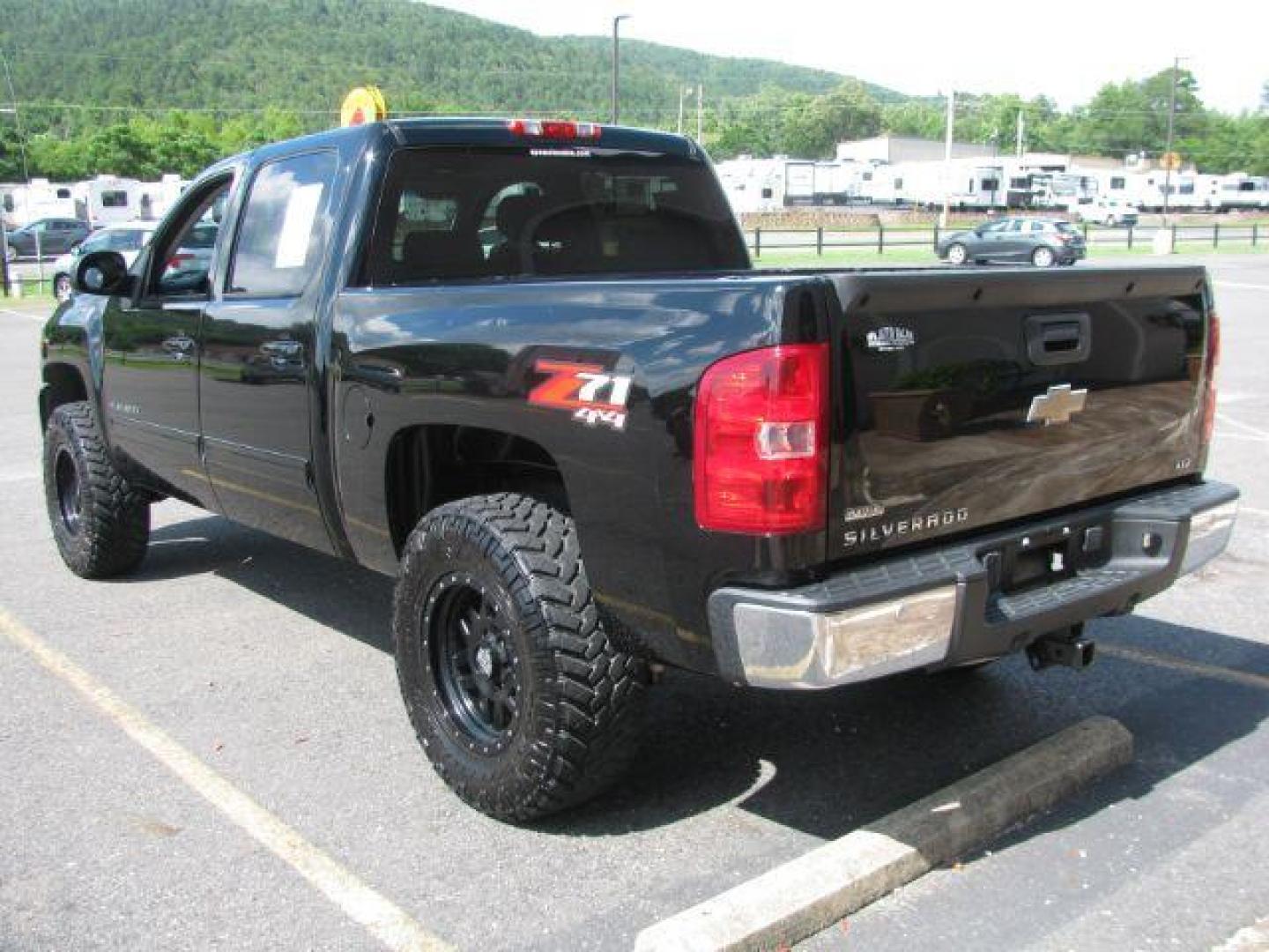 2010 Black Chevrolet Silverado 1500 LTZ (3GCRKTE32AG) with an Vortec 5.3L V-8 variable valve control engine, Automatic transmission, located at 2443 Albert Pike, Hot Springs, AR, 71913, (501) 623-6255, 34.492222, -93.109993 - Photo#2