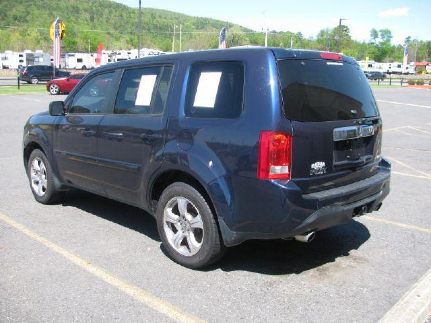 2014 Blue Honda Pilot EX-L (5FNYF3H52EB) with an 3.5L V-6 i-VTEC VCM variable valve control engine, located at 2443 Albert Pike, Hot Springs, AR, 71913, (501) 623-6255, 34.492222, -93.109993 - Photo#2