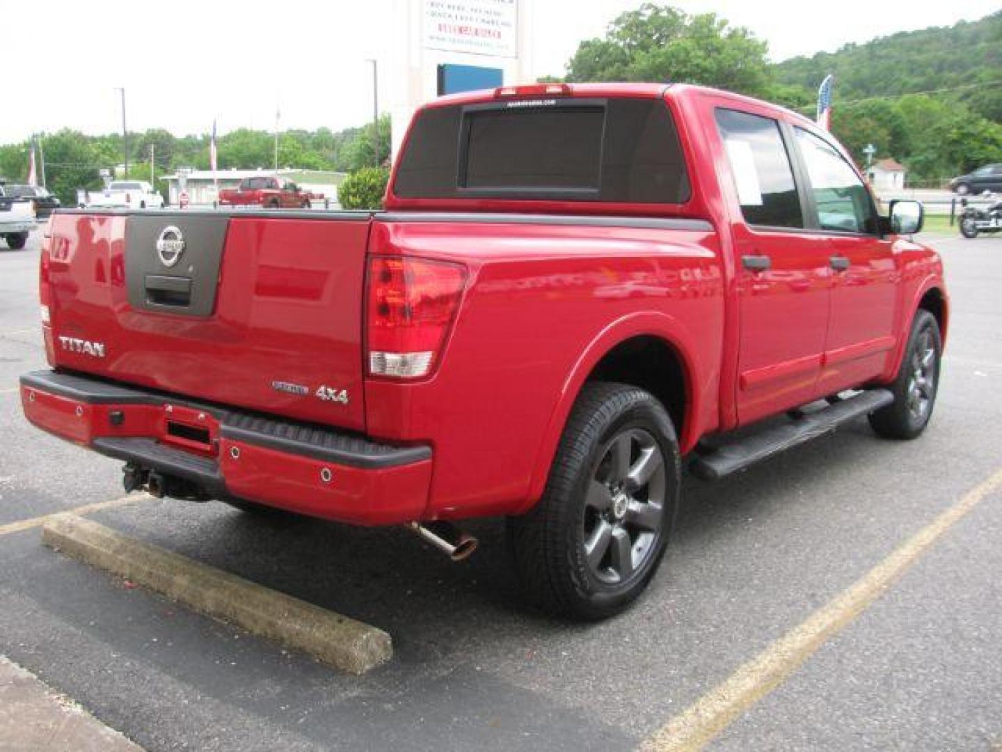 2012 Red Nissan Titan SV (1N6BA0EJ8CN) with an Endurance 5.6L V-8 DOHC engine, Automatic transmission, located at 2443 Albert Pike, Hot Springs, AR, 71913, (501) 623-6255, 34.492222, -93.109993 - Photo#4