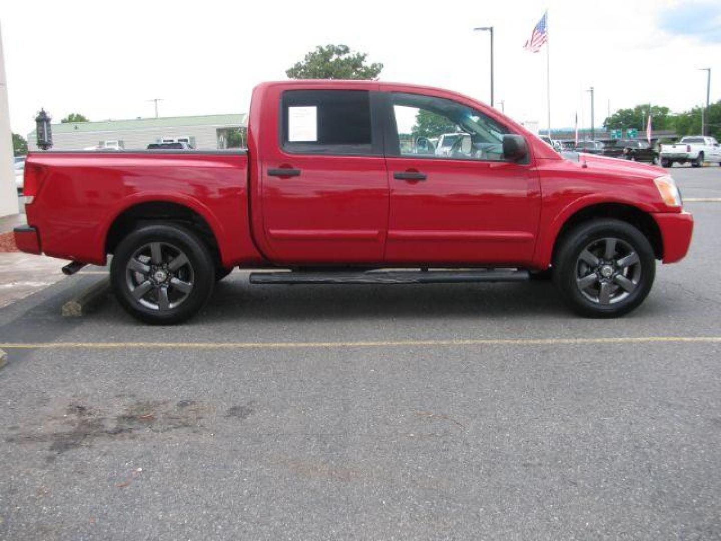2012 Red Nissan Titan SV (1N6BA0EJ8CN) with an Endurance 5.6L V-8 DOHC engine, Automatic transmission, located at 2443 Albert Pike, Hot Springs, AR, 71913, (501) 623-6255, 34.492222, -93.109993 - Photo#5