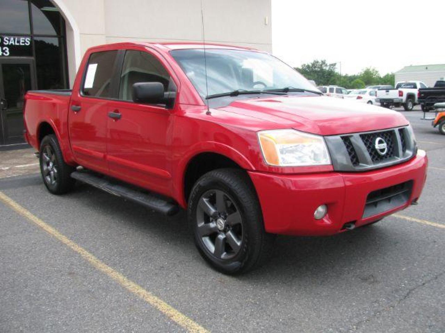 2012 Red Nissan Titan SV (1N6BA0EJ8CN) with an Endurance 5.6L V-8 DOHC engine, Automatic transmission, located at 2443 Albert Pike, Hot Springs, AR, 71913, (501) 623-6255, 34.492222, -93.109993 - Photo#6
