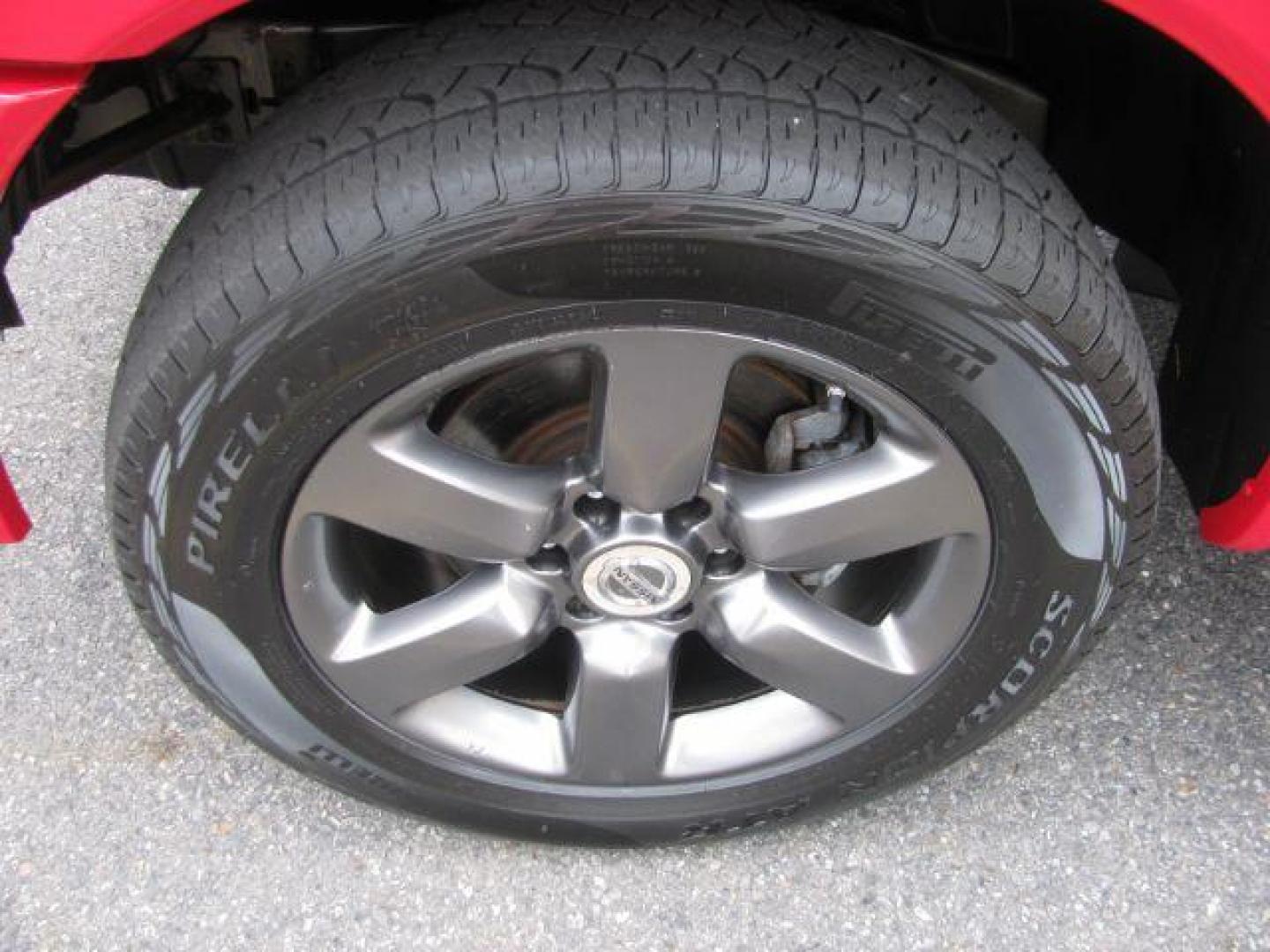 2012 Red Nissan Titan SV (1N6BA0EJ8CN) with an Endurance 5.6L V-8 DOHC engine, Automatic transmission, located at 2443 Albert Pike, Hot Springs, AR, 71913, (501) 623-6255, 34.492222, -93.109993 - Photo#7