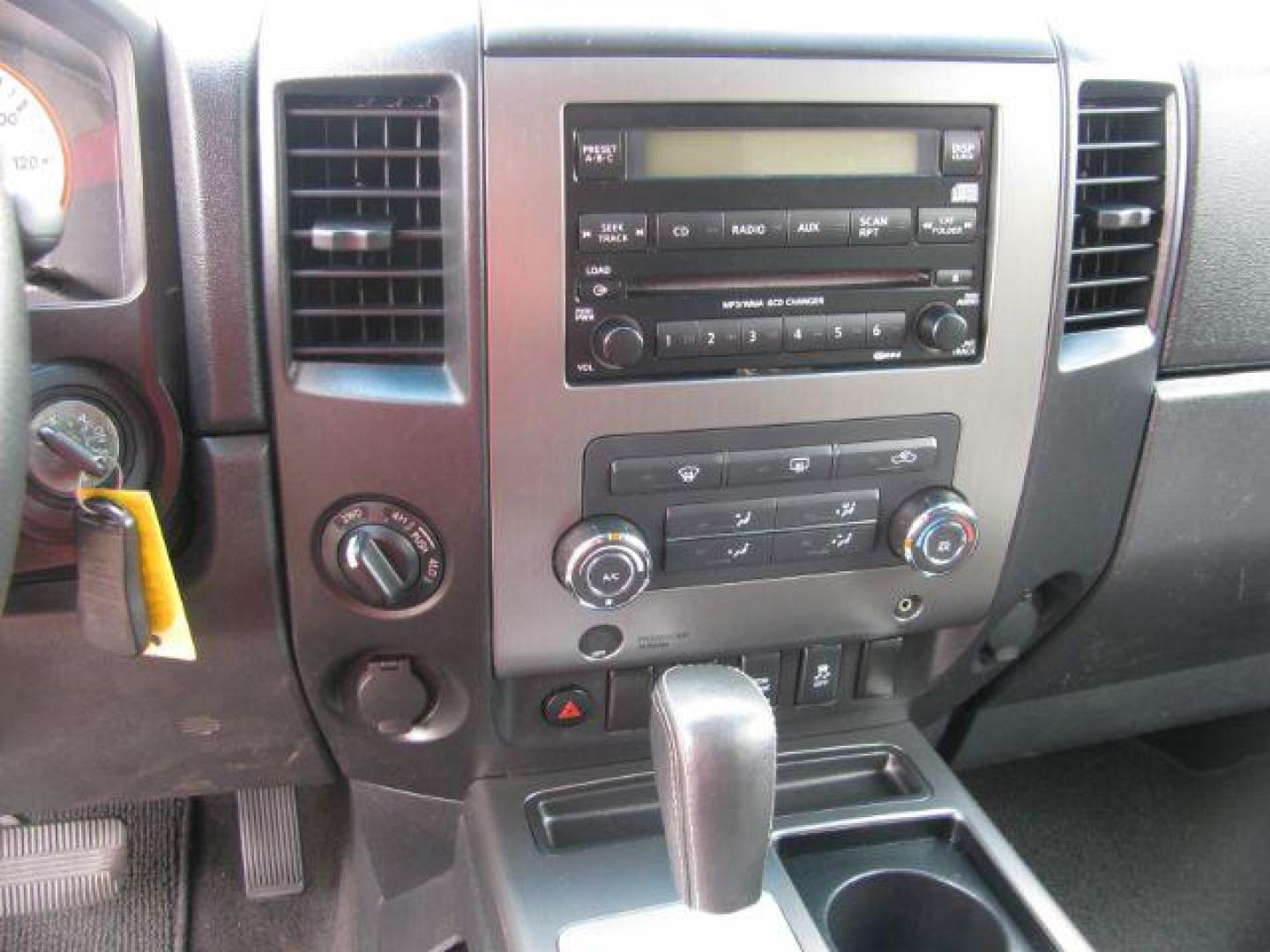2012 Red Nissan Titan SV (1N6BA0EJ8CN) with an Endurance 5.6L V-8 DOHC engine, Automatic transmission, located at 2443 Albert Pike, Hot Springs, AR, 71913, (501) 623-6255, 34.492222, -93.109993 - Photo#10