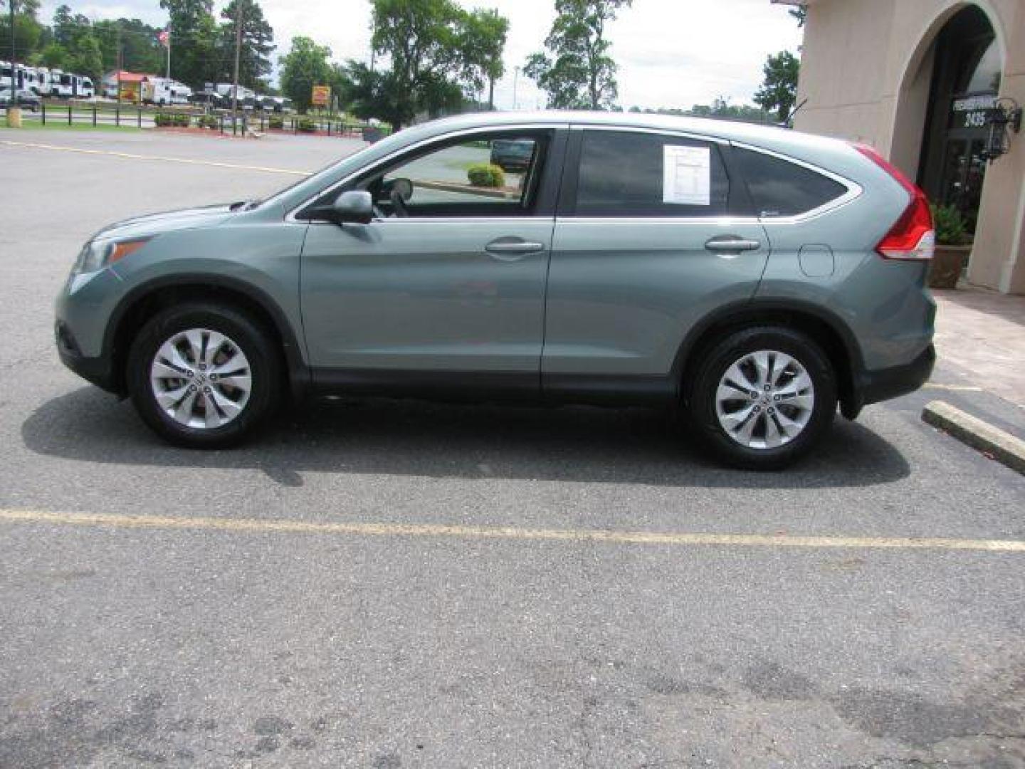 2012 Green Honda CR-V EX (2HKRM4H56CH) with an 2.4L I-4 DOHC engine, Automatic transmission, located at 2443 Albert Pike, Hot Springs, AR, 71913, (501) 623-6255, 34.492222, -93.109993 - Photo#1