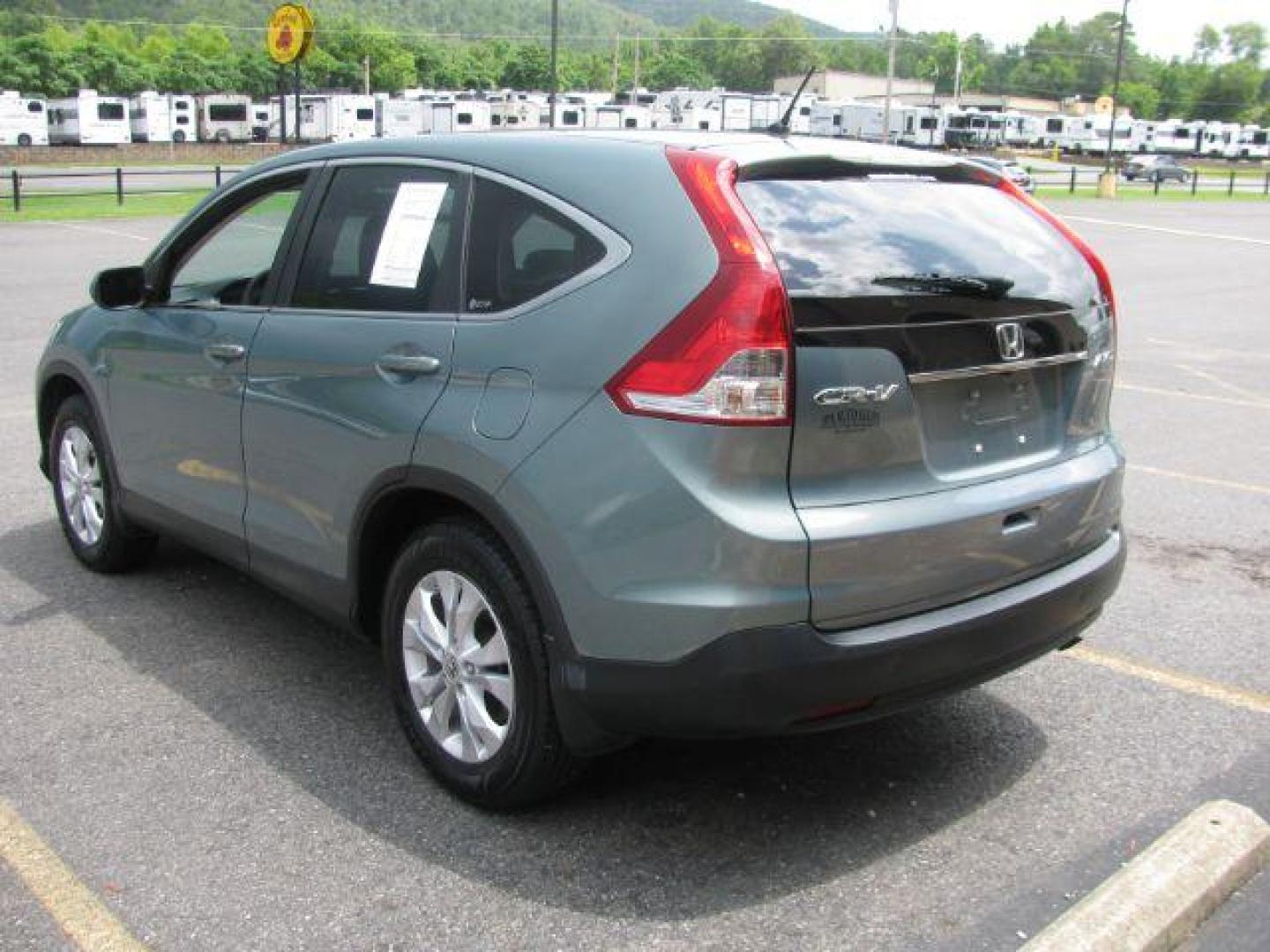 2012 Green Honda CR-V EX (2HKRM4H56CH) with an 2.4L I-4 DOHC engine, Automatic transmission, located at 2443 Albert Pike, Hot Springs, AR, 71913, (501) 623-6255, 34.492222, -93.109993 - Photo#2