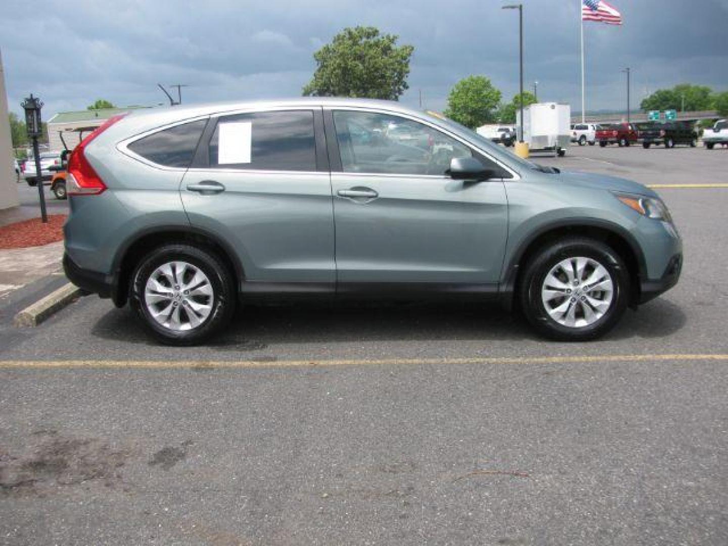 2012 Green Honda CR-V EX (2HKRM4H56CH) with an 2.4L I-4 DOHC engine, Automatic transmission, located at 2443 Albert Pike, Hot Springs, AR, 71913, (501) 623-6255, 34.492222, -93.109993 - Photo#4