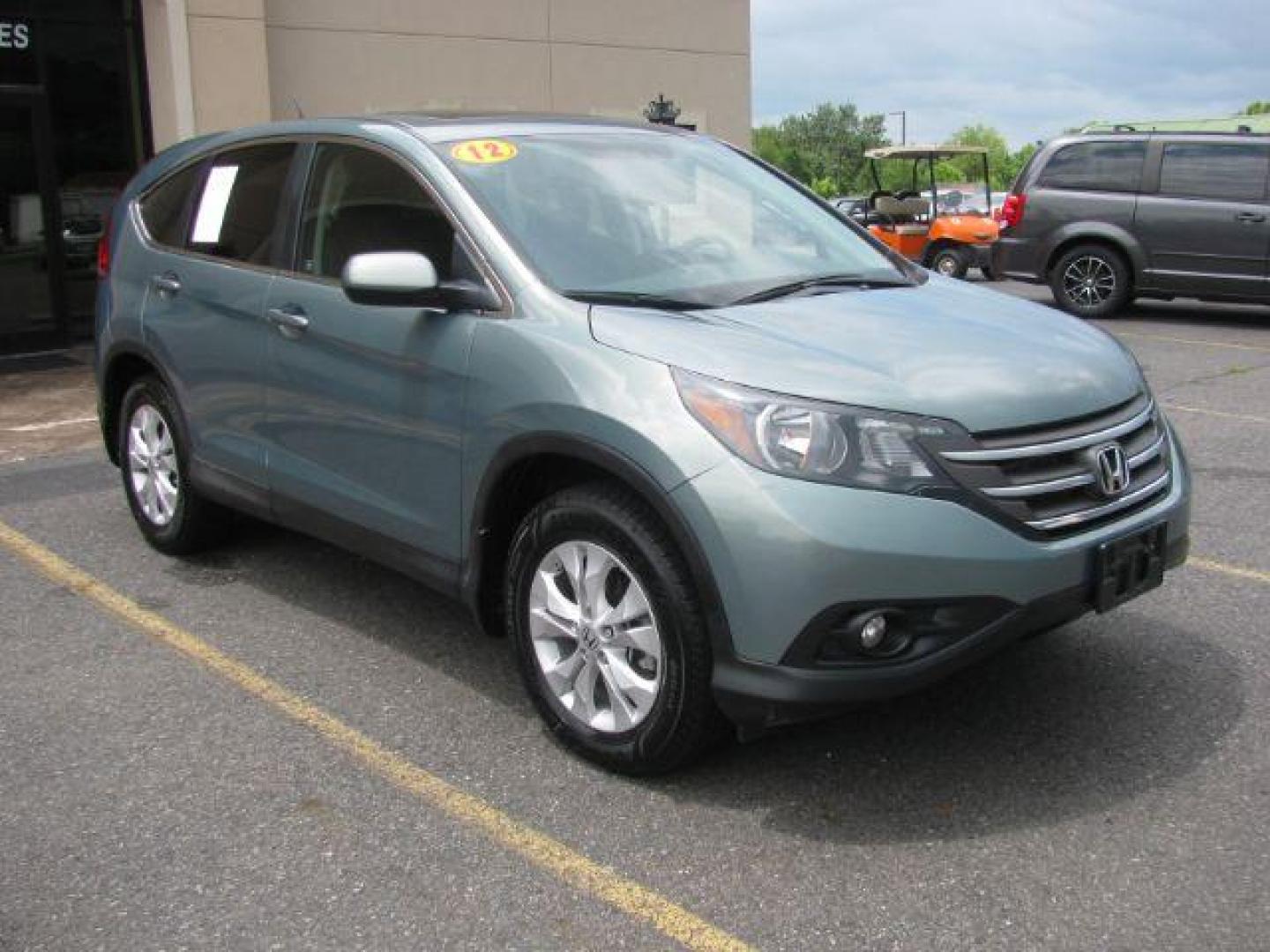 2012 Green Honda CR-V EX (2HKRM4H56CH) with an 2.4L I-4 DOHC engine, Automatic transmission, located at 2443 Albert Pike, Hot Springs, AR, 71913, (501) 623-6255, 34.492222, -93.109993 - Photo#5