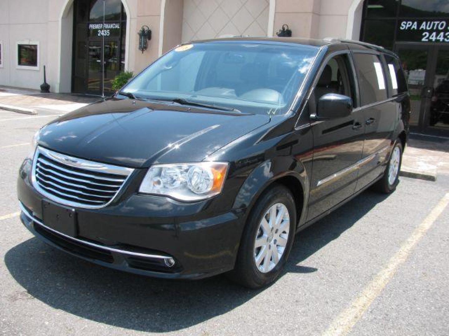2016 Black Chrysler Town and Country Touring (2C4RC1BG1GR) with an Pentastar 3.6L V-6 DOHC engine, Automatic transmission, located at 2443 Albert Pike, Hot Springs, AR, 71913, (501) 623-6255, 34.492222, -93.109993 - Photo#0