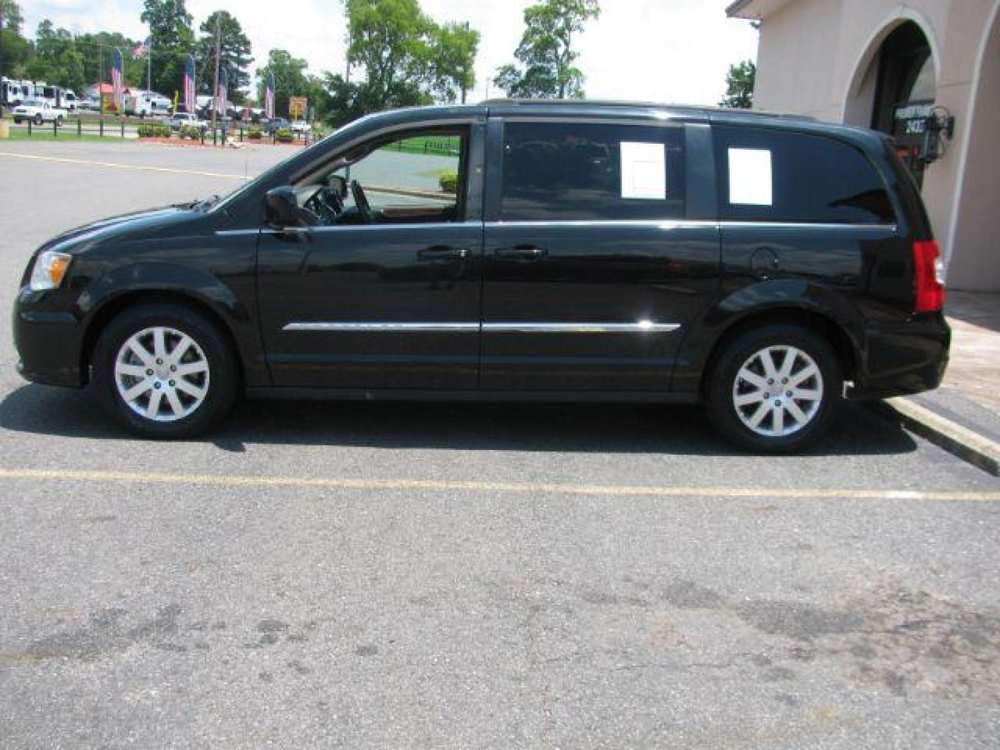 2016 Black Chrysler Town and Country Touring (2C4RC1BG1GR) with an Pentastar 3.6L V-6 DOHC engine, Automatic transmission, located at 2443 Albert Pike, Hot Springs, AR, 71913, (501) 623-6255, 34.492222, -93.109993 - Photo#1