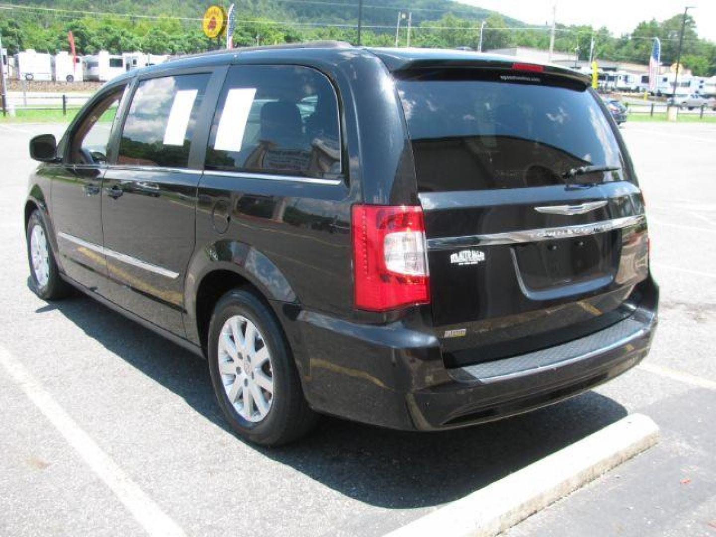 2016 Black Chrysler Town and Country Touring (2C4RC1BG1GR) with an Pentastar 3.6L V-6 DOHC engine, Automatic transmission, located at 2443 Albert Pike, Hot Springs, AR, 71913, (501) 623-6255, 34.492222, -93.109993 - Photo#2