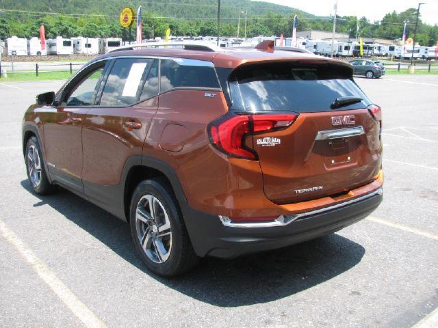2019 Orange GMC Terrain SLT (3GKALPEV6KL) with an 1.5L I-4 gasoline direct injection engine, Automatic transmission, located at 2443 Albert Pike, Hot Springs, AR, 71913, (501) 623-6255, 34.492222, -93.109993 - Photo#2