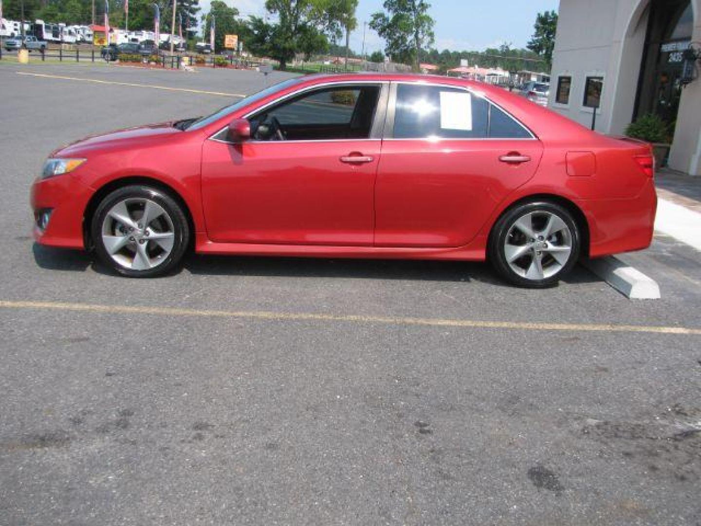 2012 Red Toyota Camry SE V6 (4T1BK1FK4CU) with an 3.5L V-6 DOHC engine, Automatic transmission, located at 2443 Albert Pike, Hot Springs, AR, 71913, (501) 623-6255, 34.492222, -93.109993 - Photo#1