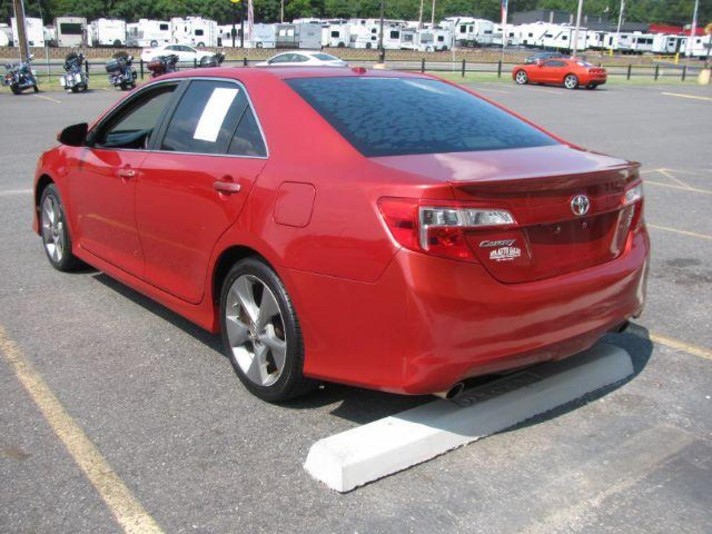 2012 Red Toyota Camry SE V6 (4T1BK1FK4CU) with an 3.5L V-6 DOHC engine, Automatic transmission, located at 2443 Albert Pike, Hot Springs, AR, 71913, (501) 623-6255, 34.492222, -93.109993 - Photo#2