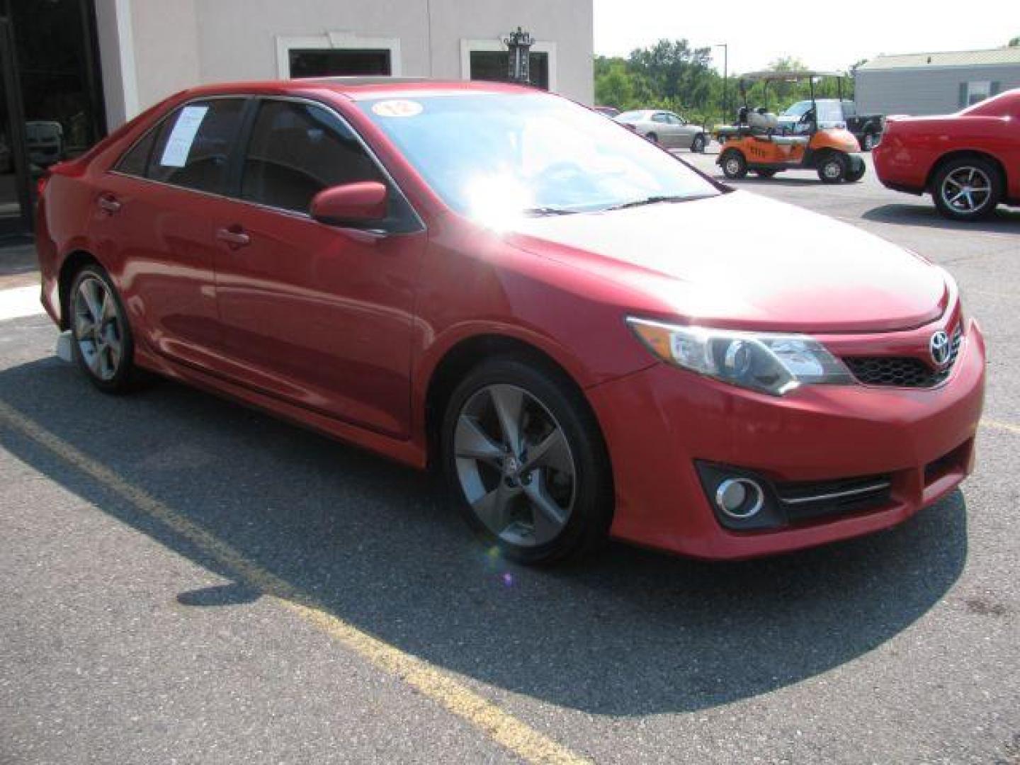 2012 Red Toyota Camry SE V6 (4T1BK1FK4CU) with an 3.5L V-6 DOHC engine, Automatic transmission, located at 2443 Albert Pike, Hot Springs, AR, 71913, (501) 623-6255, 34.492222, -93.109993 - Photo#5